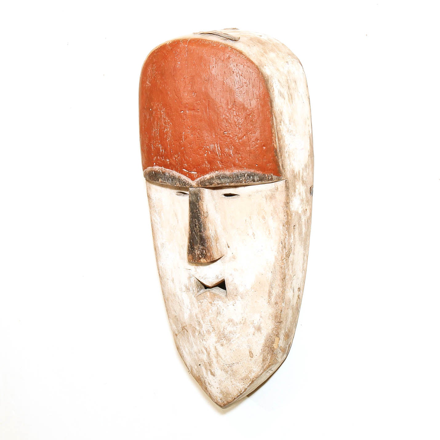 Decorative D.R. Congo mask with bold red and white design