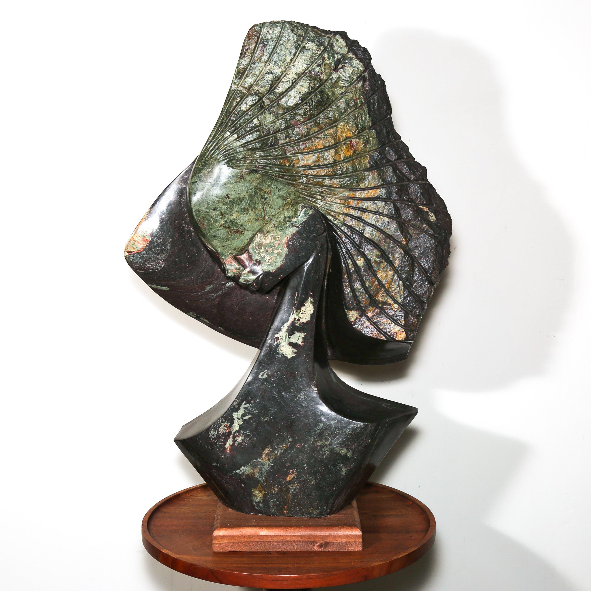 "Deep In Memory" by Lovemore Bonjisi as abeautiful African sculpture of a woman