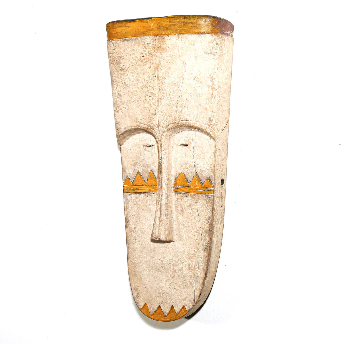 Hand-carved Fang mask from Gabon featuring a long facial profile, smooth contours, and distinctive regional styling