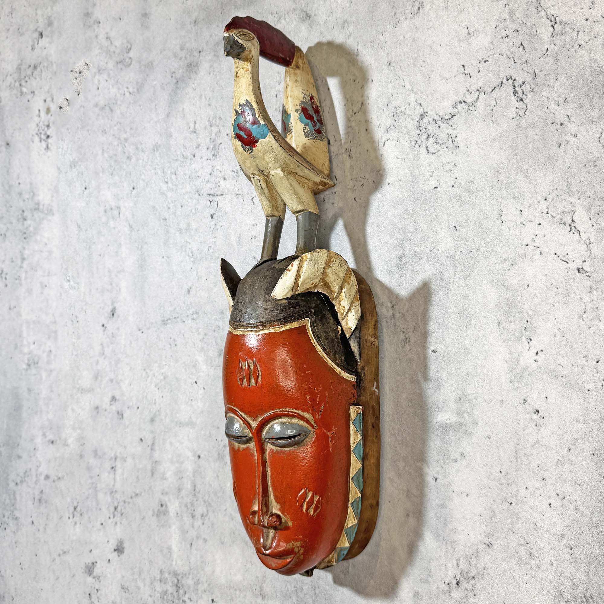 Guro Mask from Côte d'Ivoire as an African mask wall decor idea left side