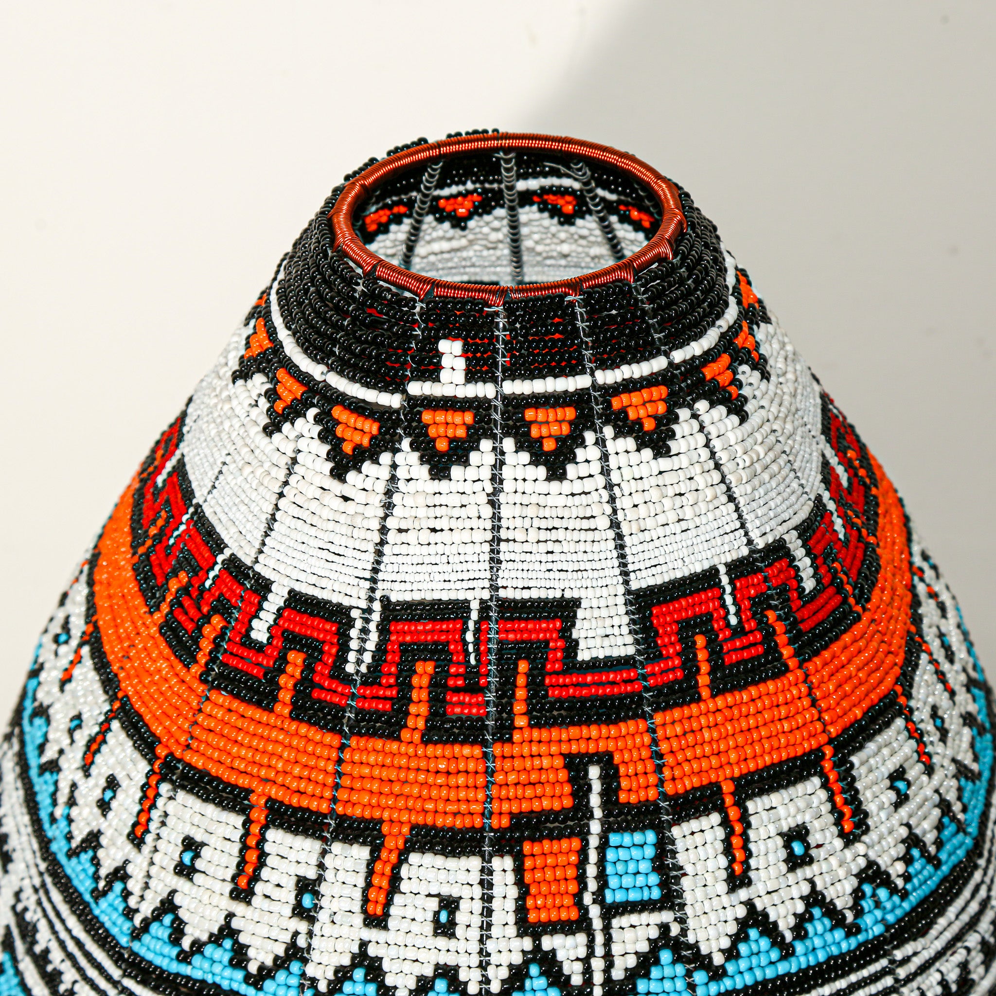 wire basket woven with beads