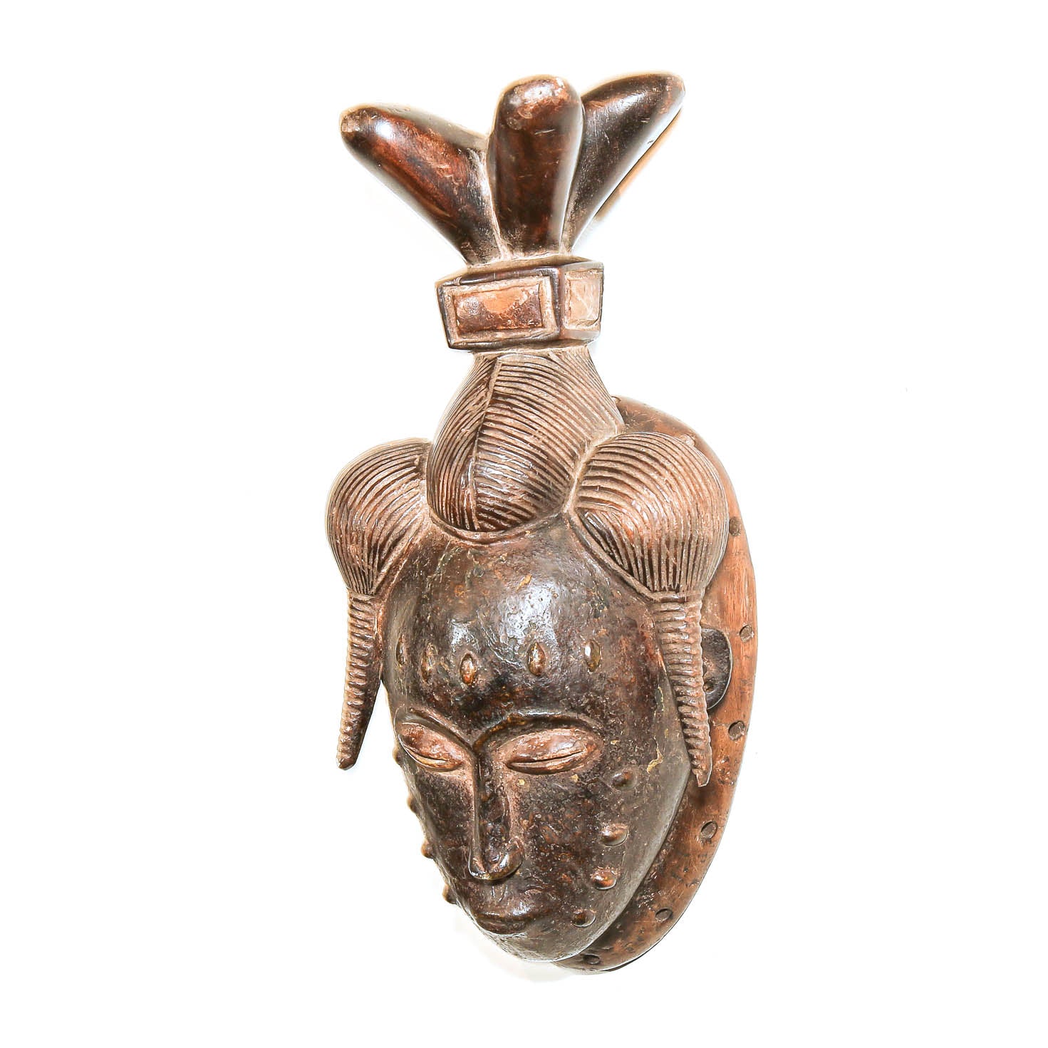 Hand-carved Baule mask with sculptural wood headdress
