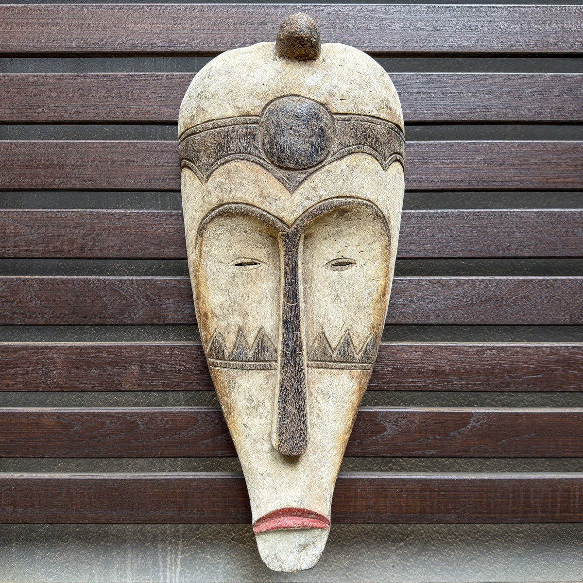 Large Fang mask from Gabon with elongated carved facial features and a commanding Central African sculptural presence