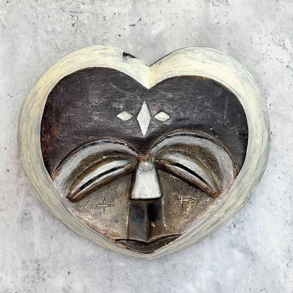 Kwele Mask from Congo as a wall decor idea in front