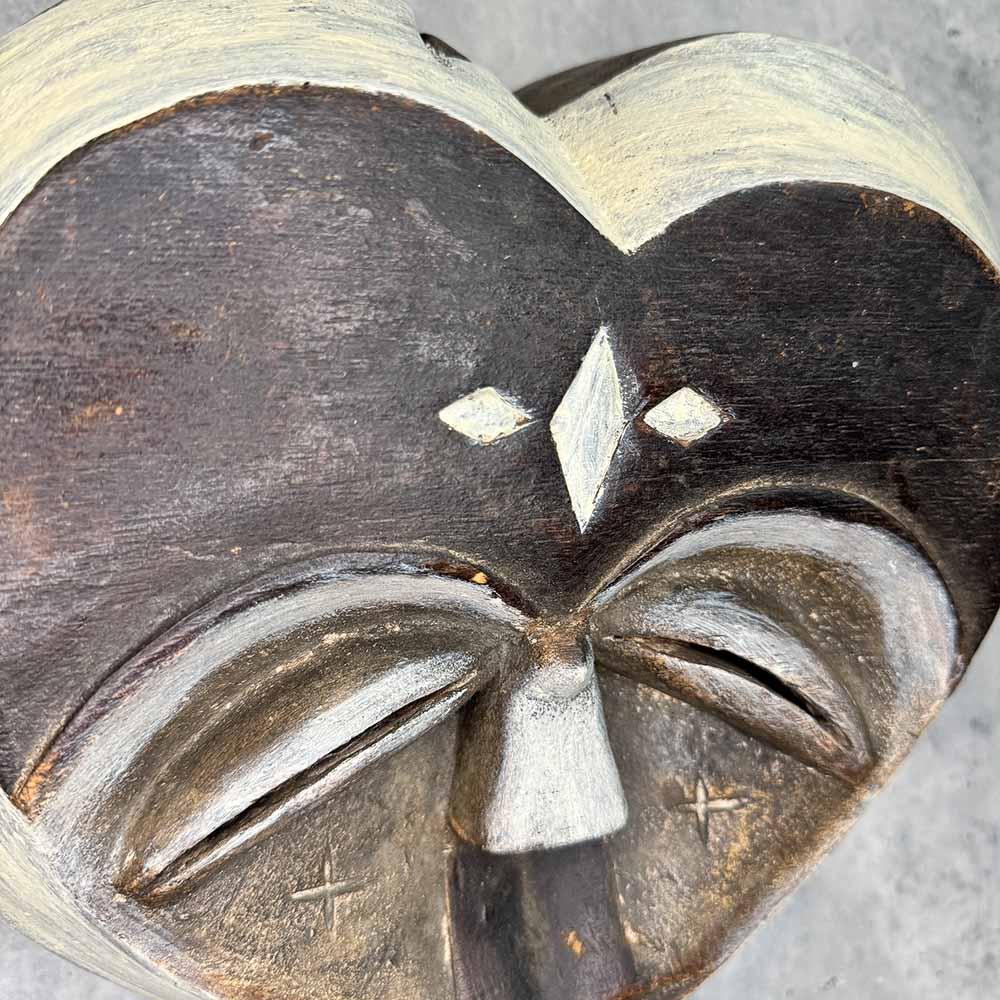 Kwele Mask from Congo as a wall decor idea up close up top