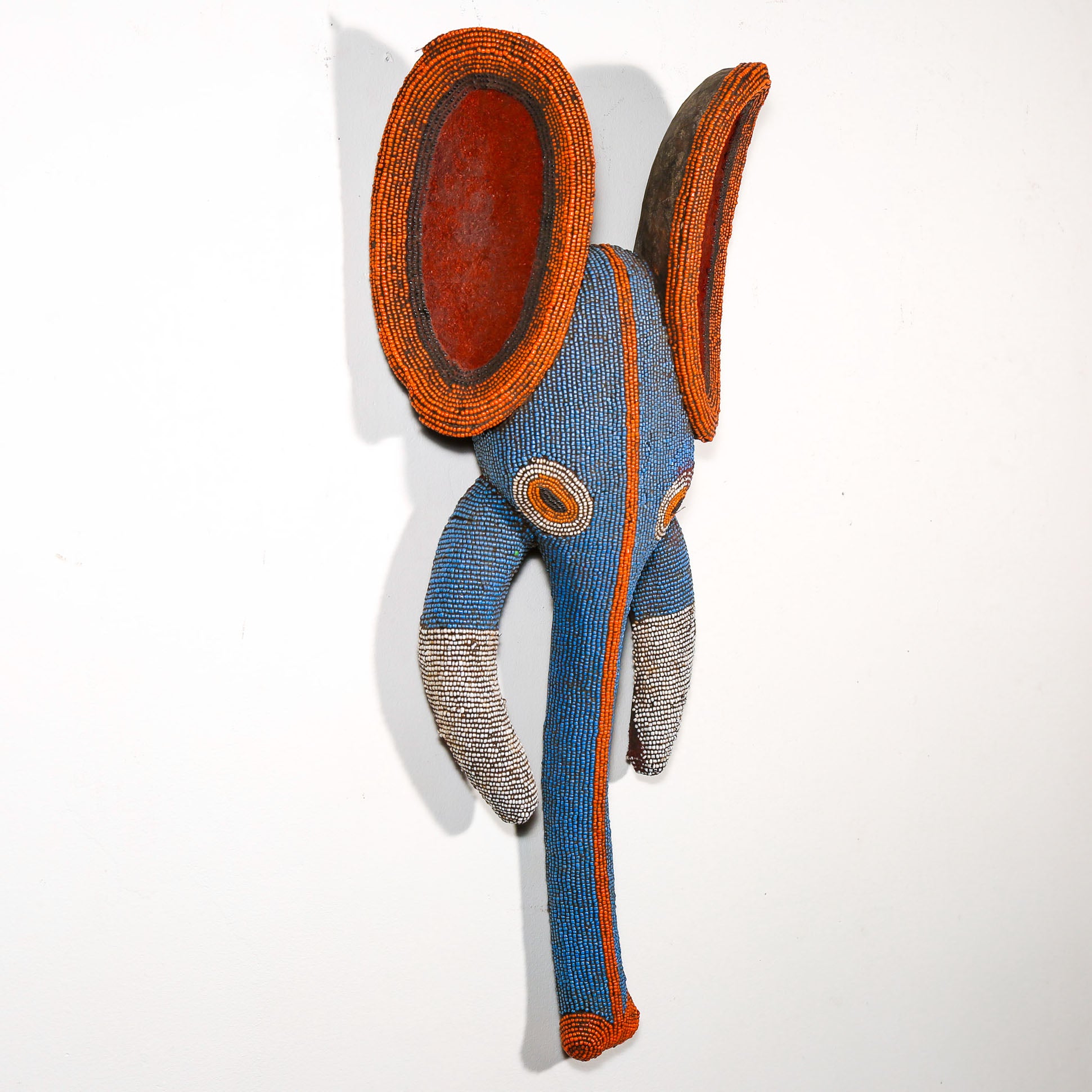 wood elephant mask with beads