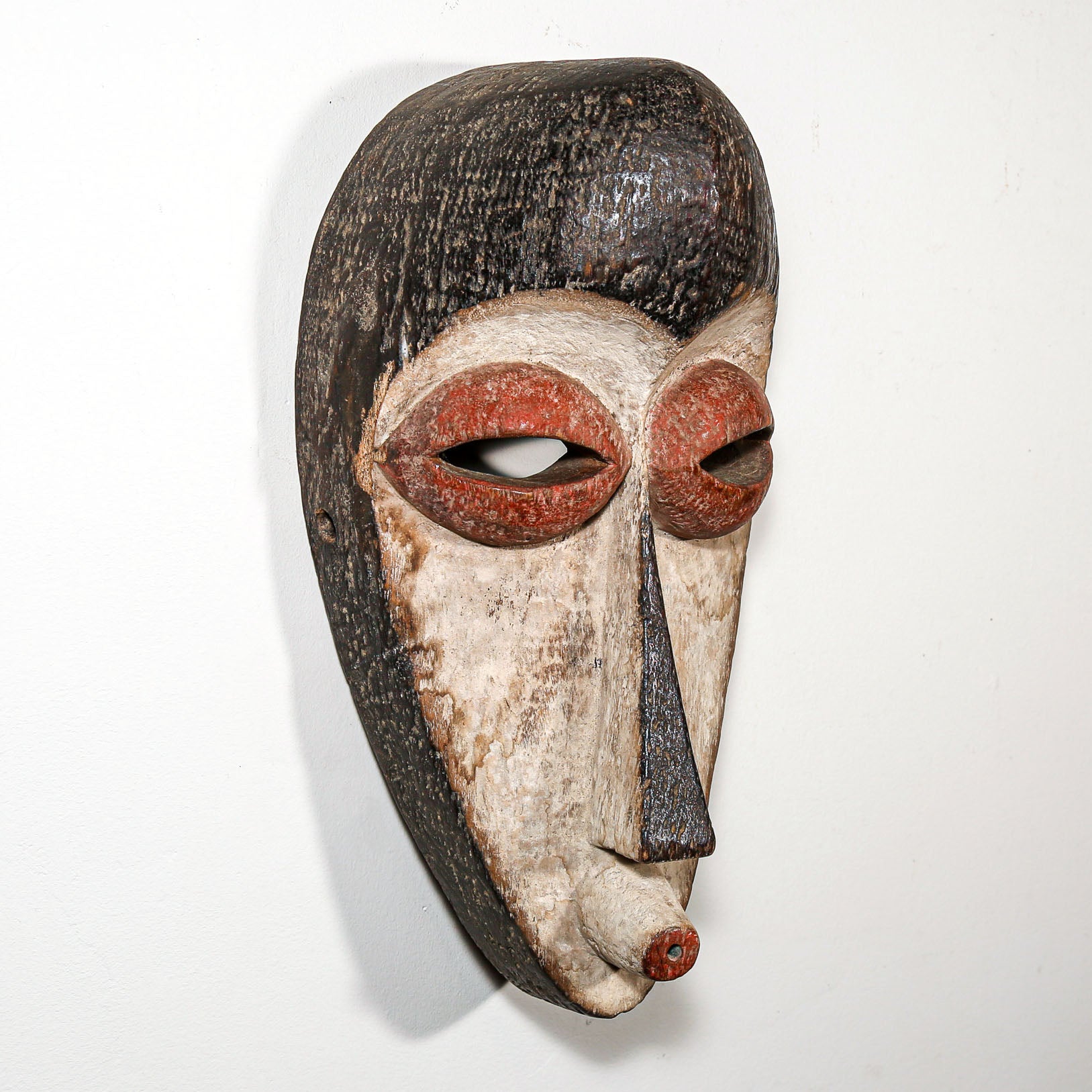 old shaped wooden mask