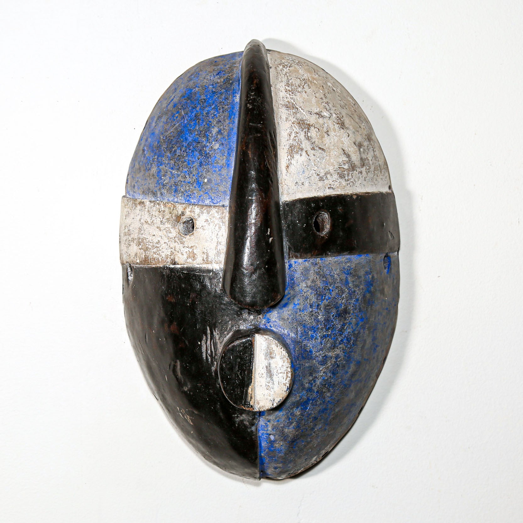 blue and white african mask