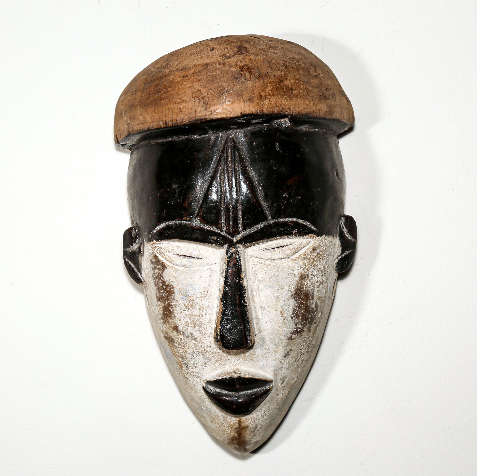 african mask is a hat