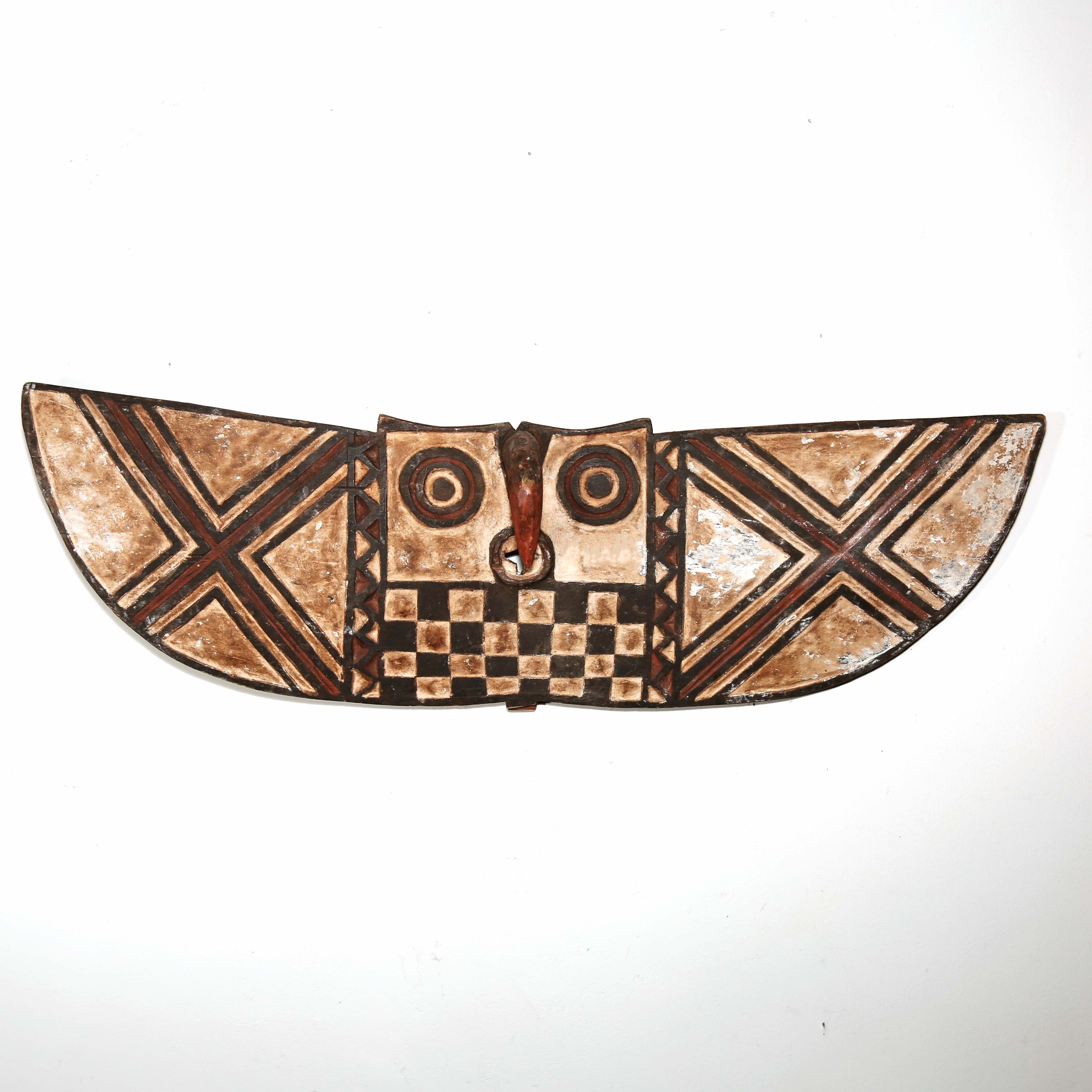 wide and narrow african mask to hang on the wall