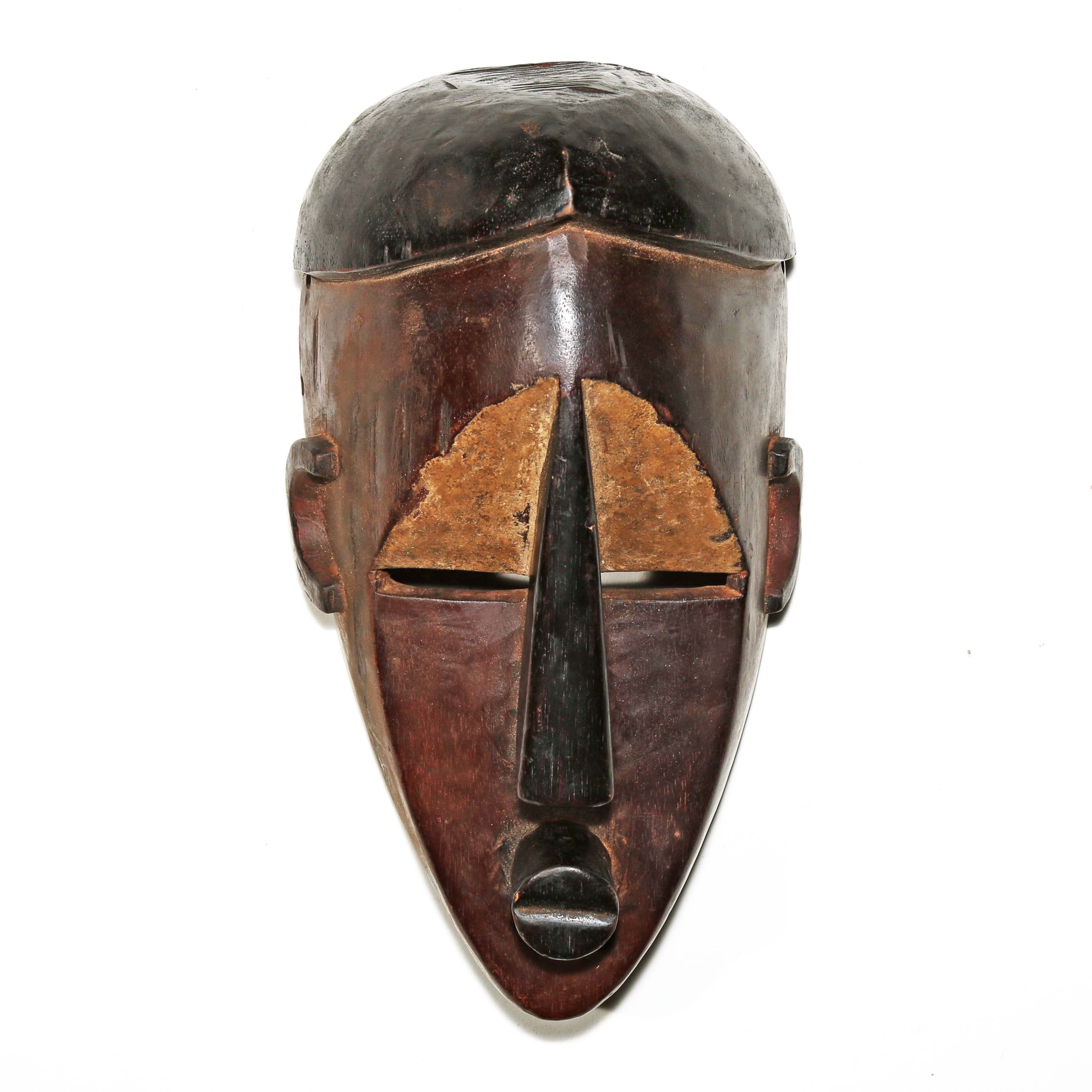 Brown and black African wood wall mask
