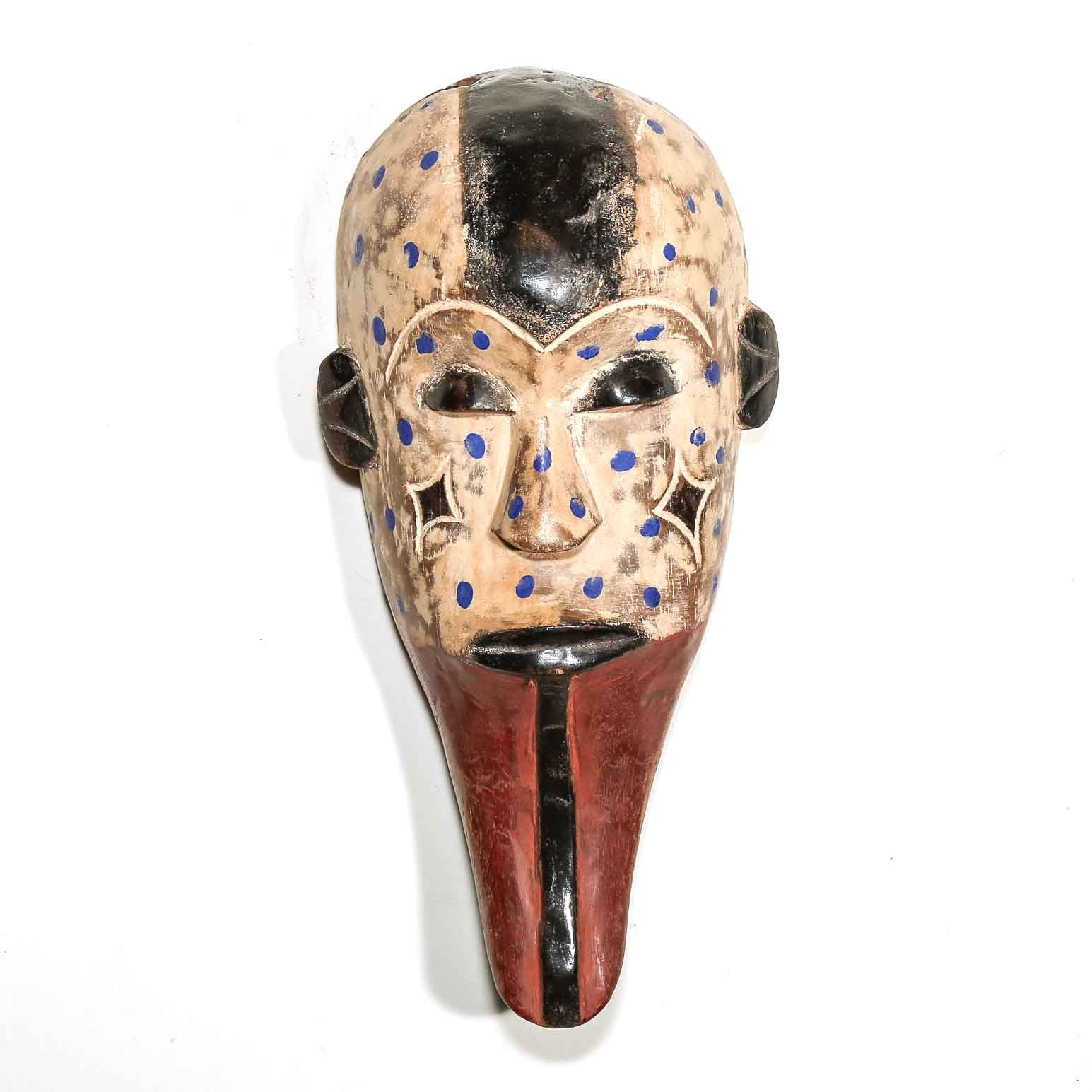 Decorative mask with blue accents on a white background