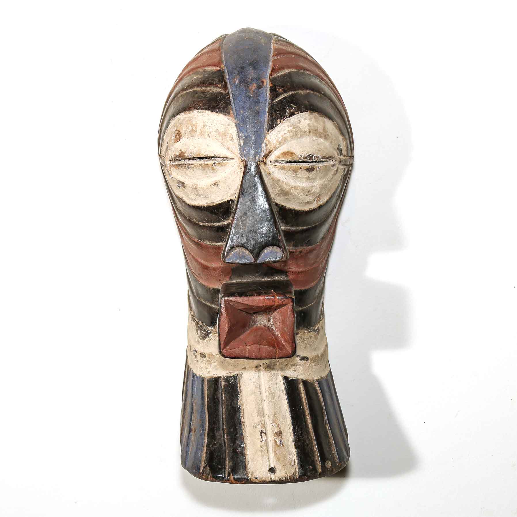 African mask with wooden texture and colorful design on a white background
