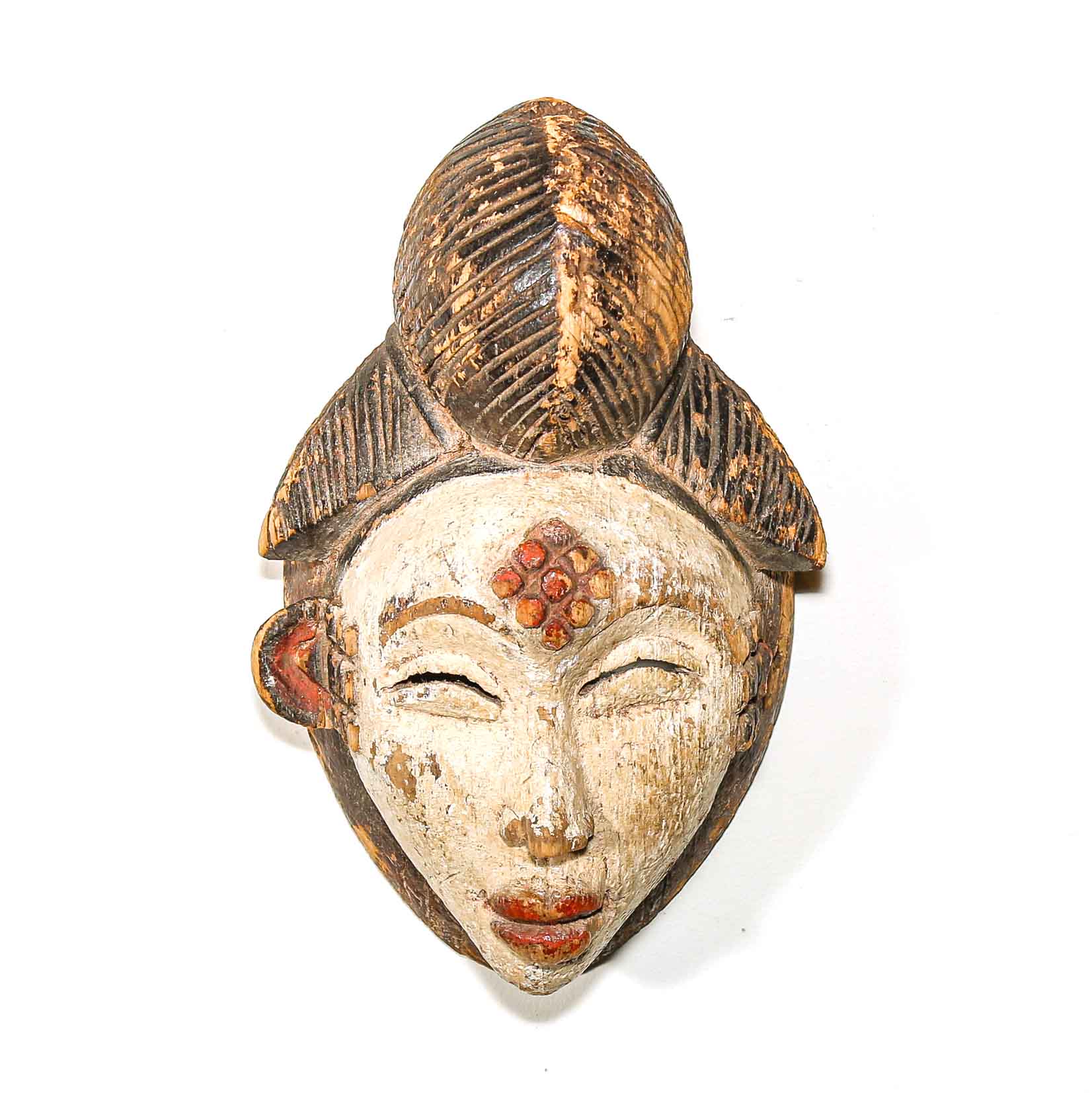 Wooden mask with facial features and decorative elements on a white background