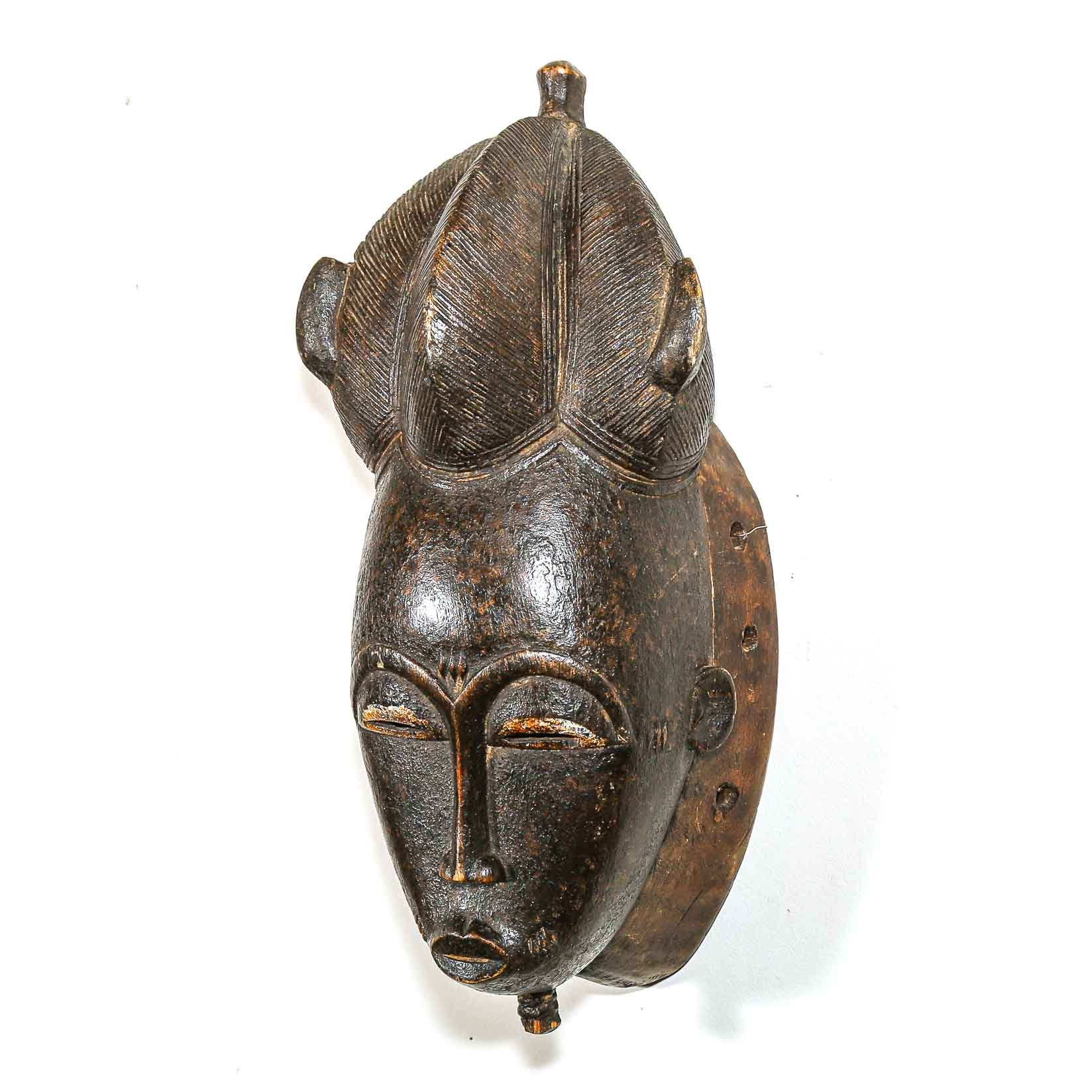 African mask with black color 
on a white background