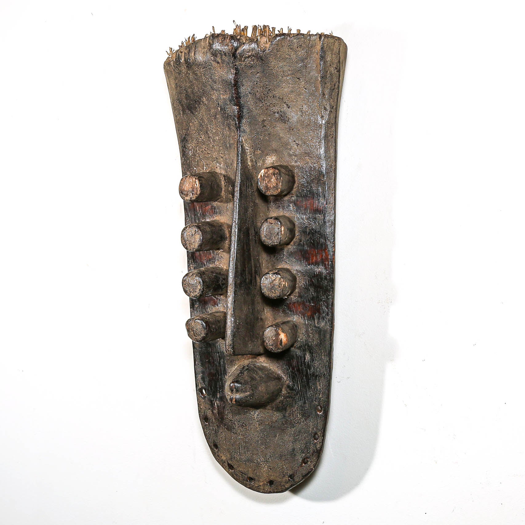 Wooden tribal african mask on a white background 
