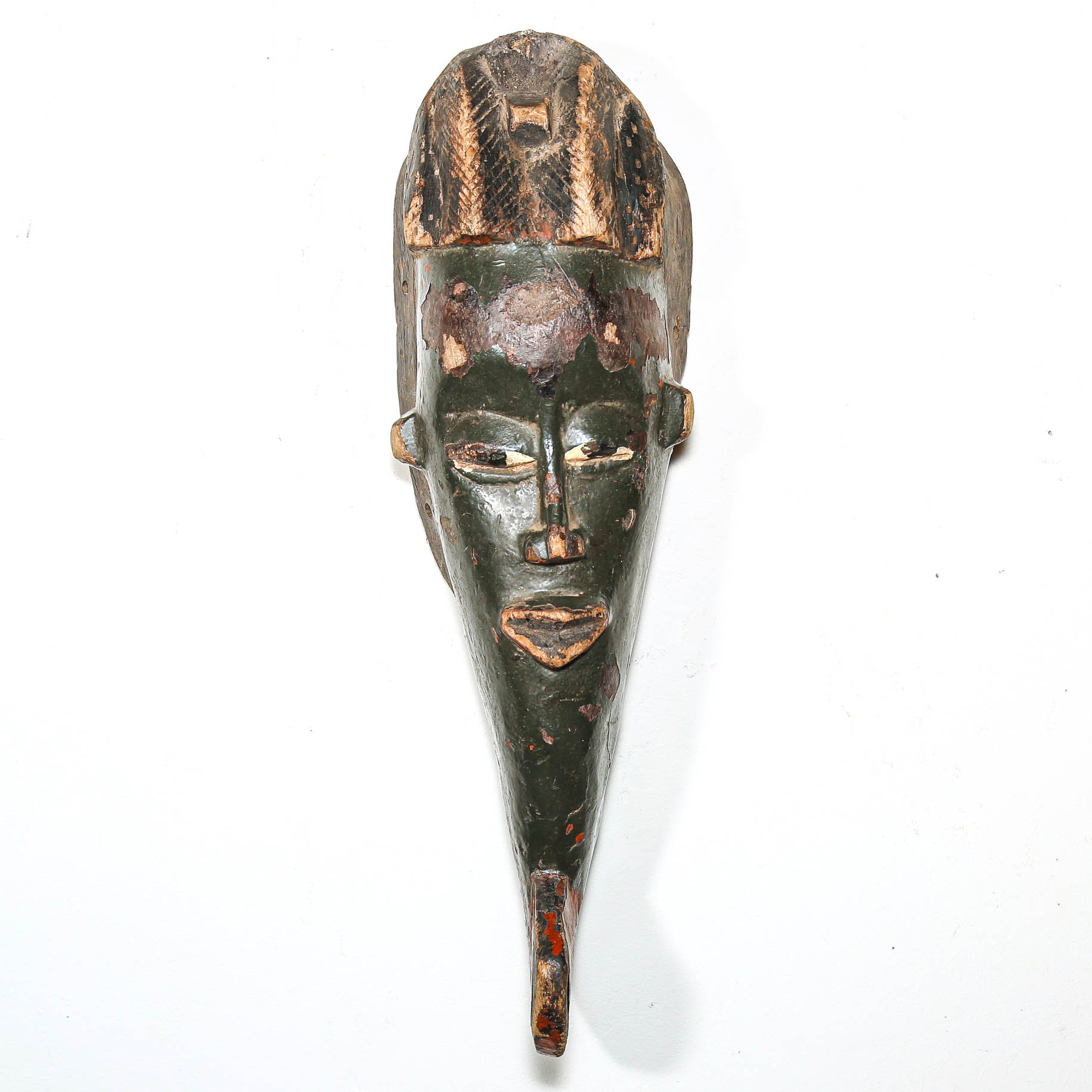 African wooden mask on a white background
