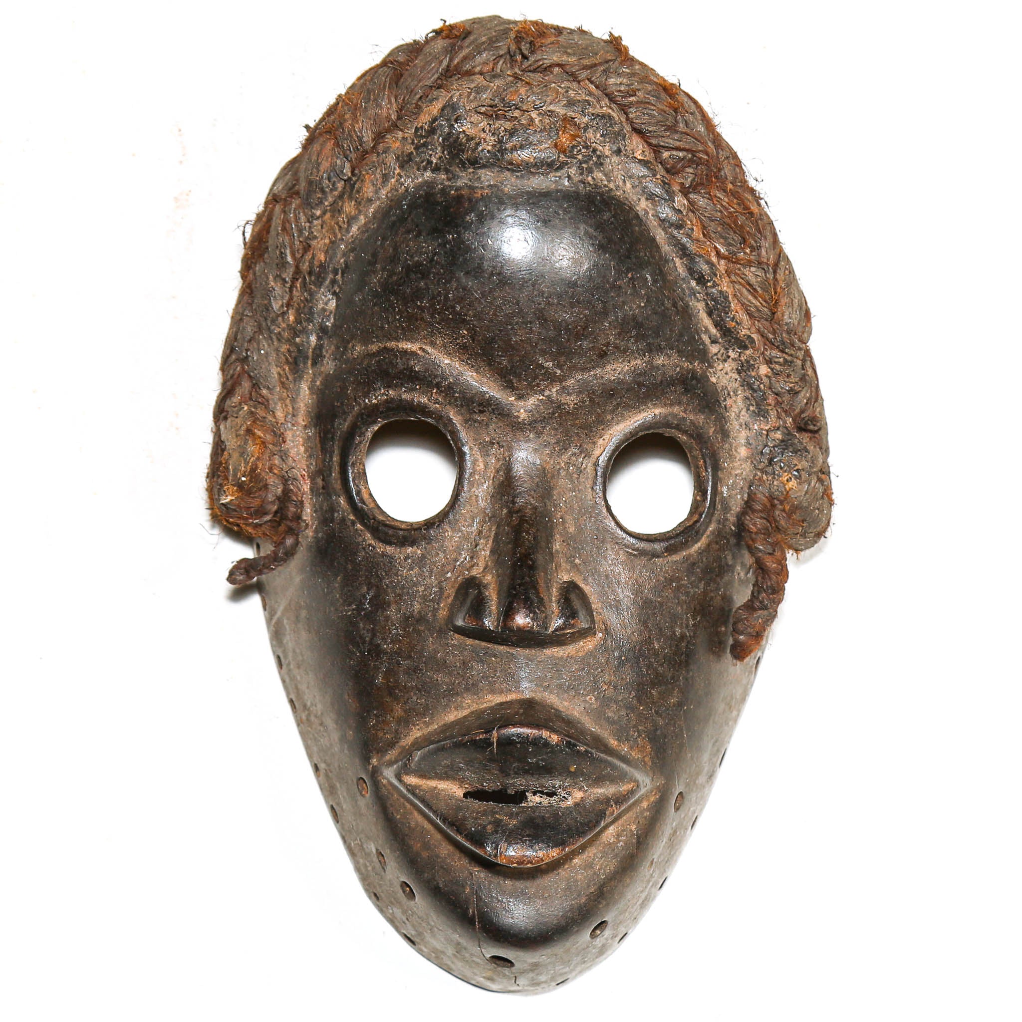 Traditional wooden mask on a white background