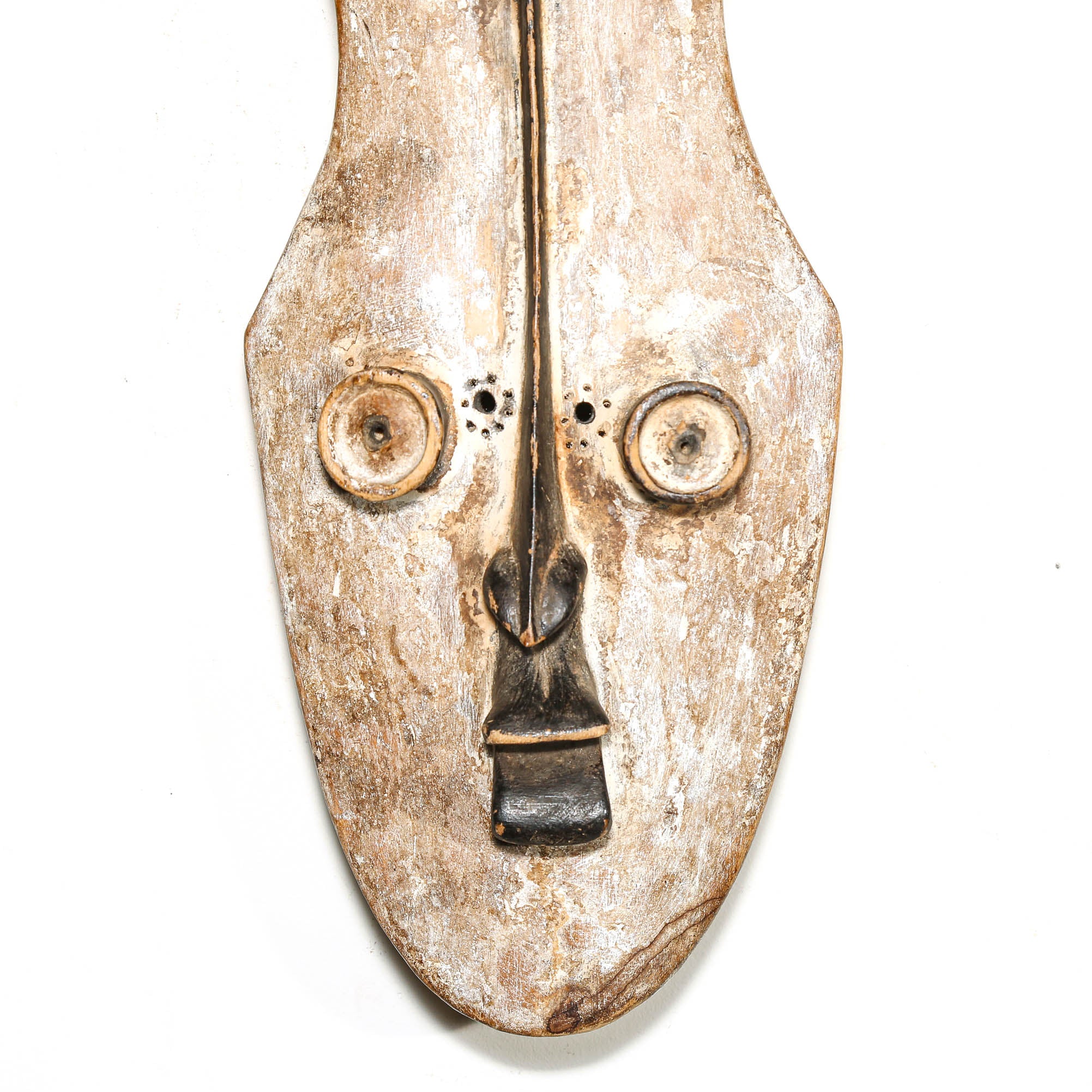 Decorative mask with a stylized face on a white background