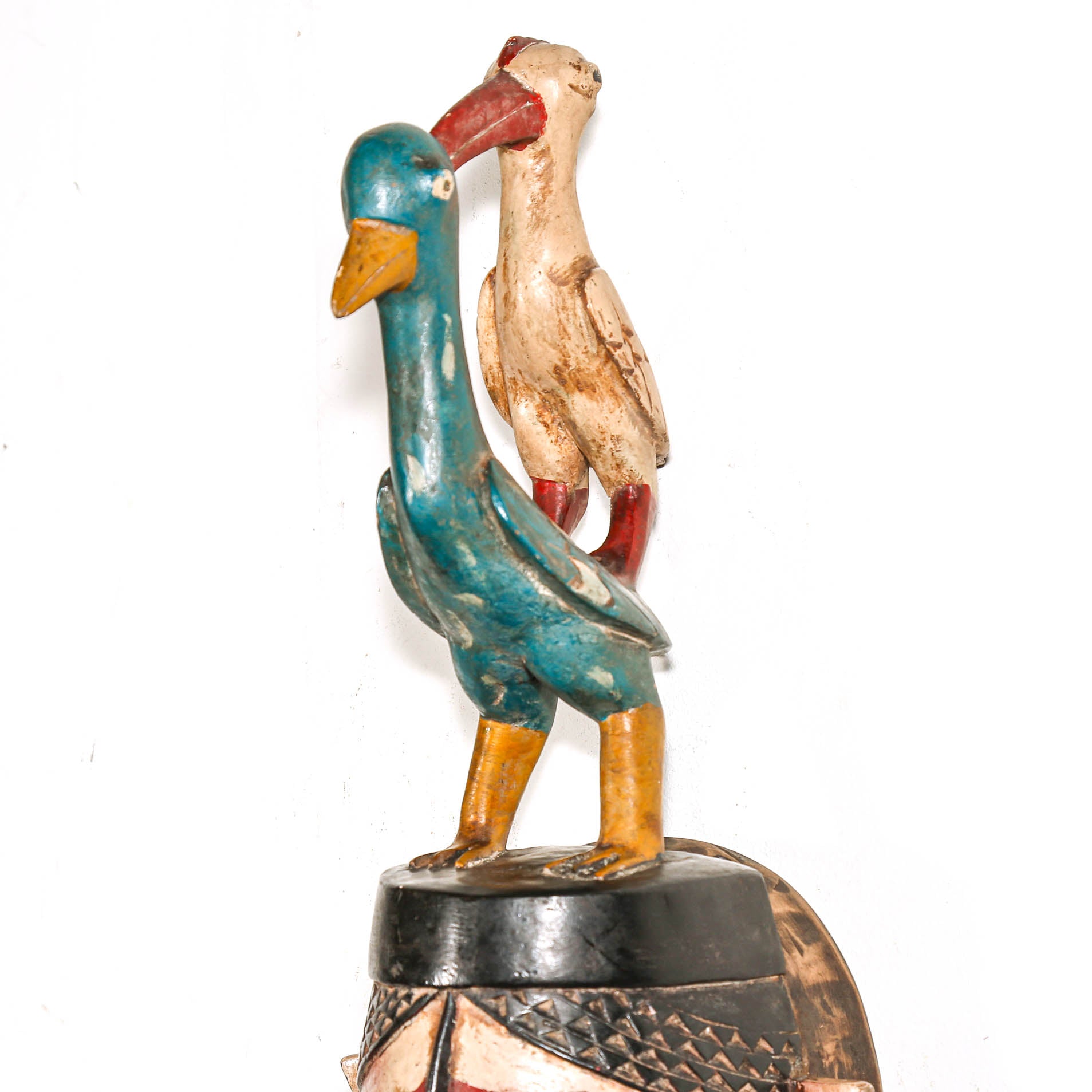 Colorful bird figures on a white background