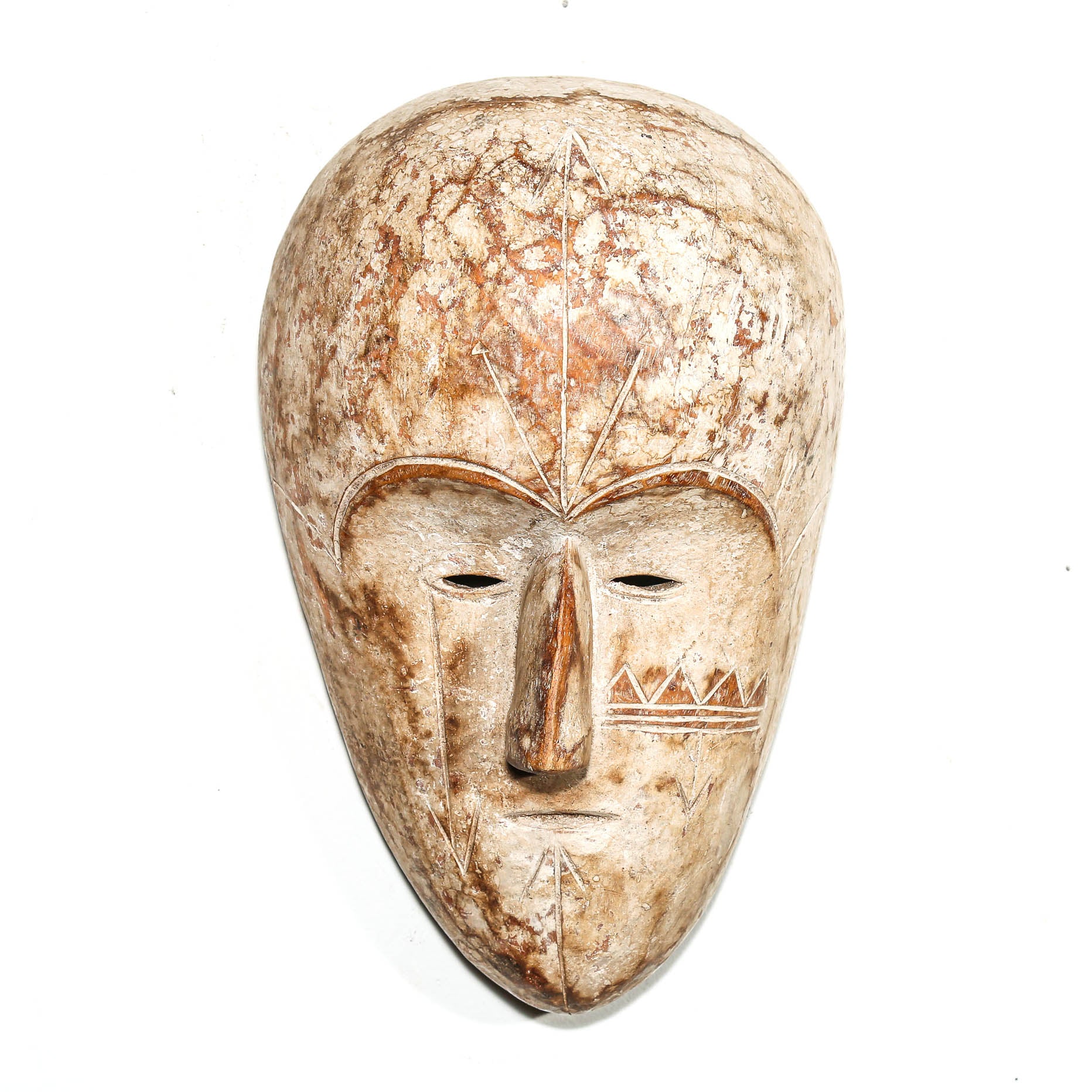 white color Carved African wooden mask on a white background
