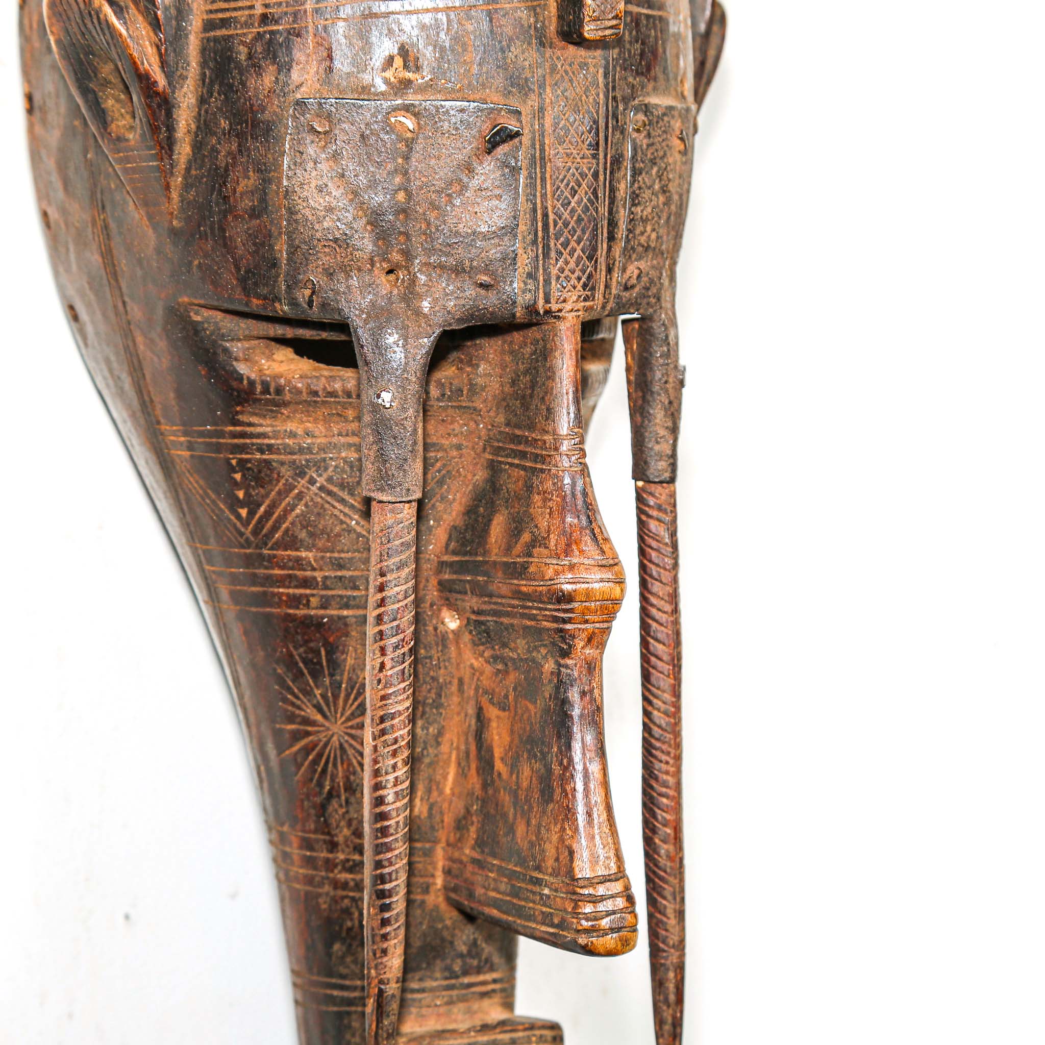 African Wooden and metal mask with intricate carvings for sale online