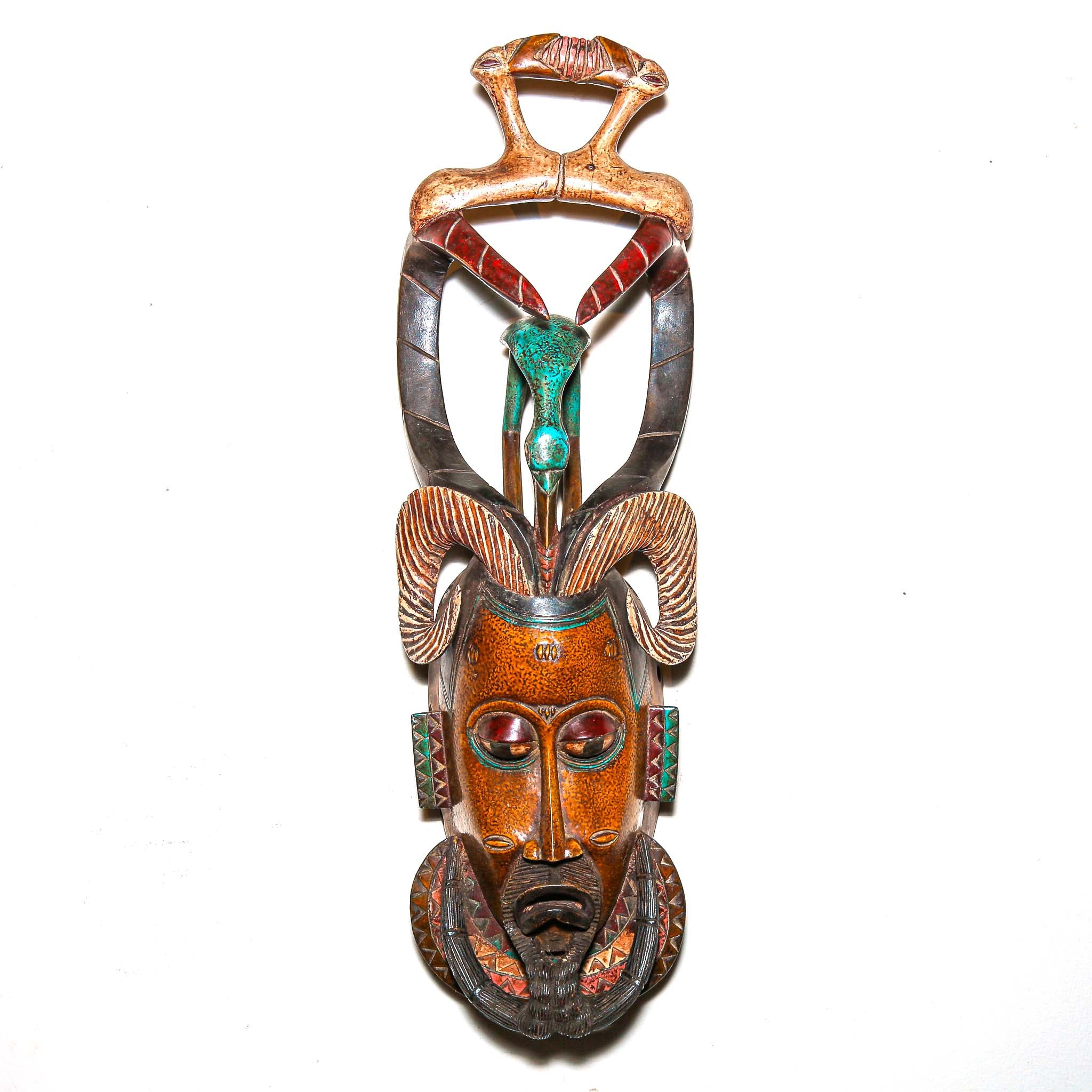 Authentic African mask to purchase online with colorful designs on a white background