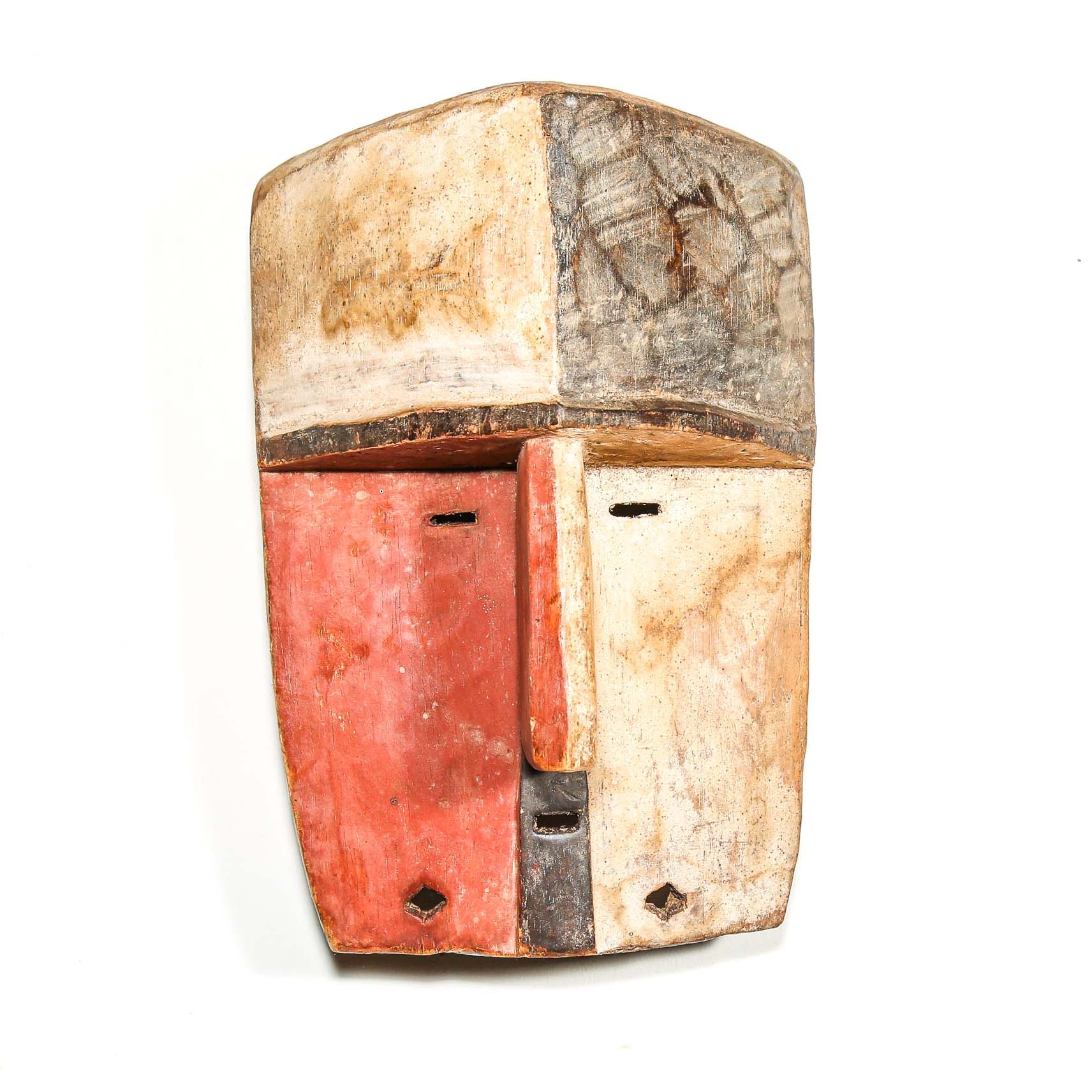 vintage Wooden African mask for sale with a checkered pattern on a white background