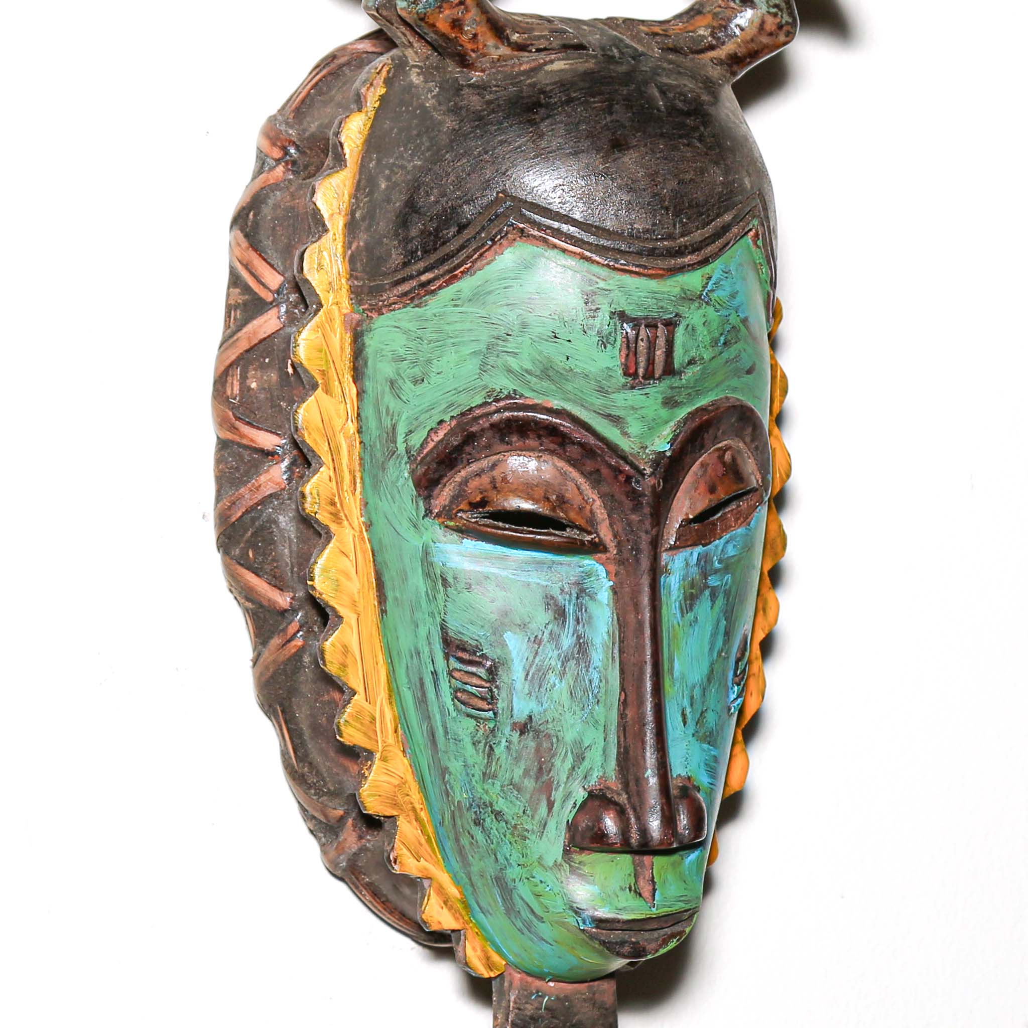 colorfil fine art african mask on a white background. Traditional art for sale 