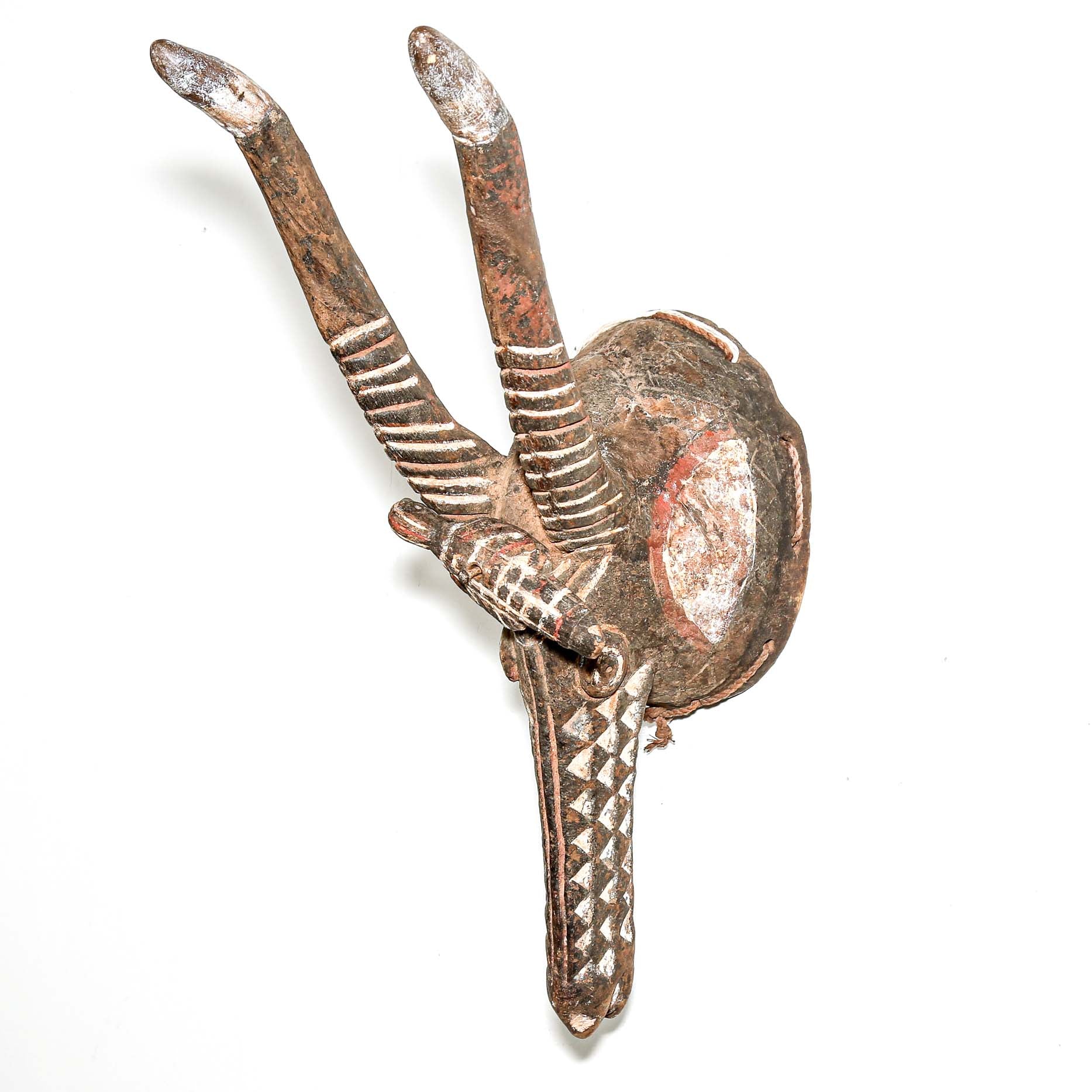 traditional tribal art mask with antlers on a white background for sale