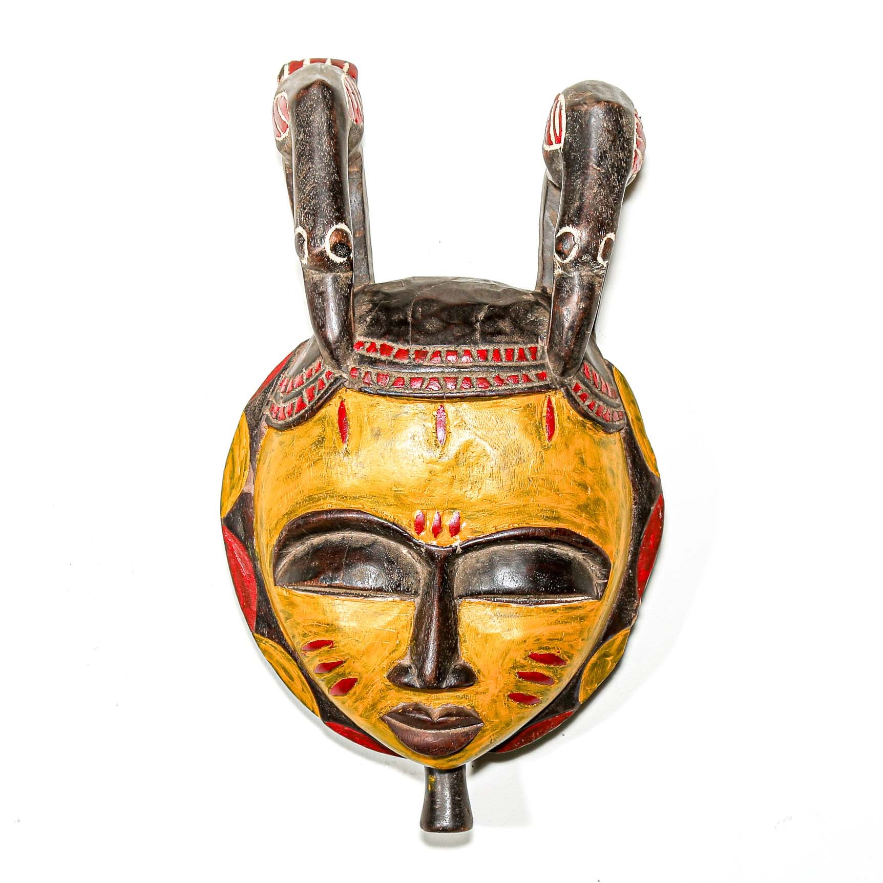 yellow wooden African mask with birds to collect and hang on your wall for fine interior design ideas. 