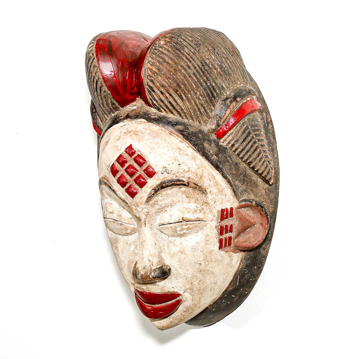 brown white and red Punu Tribal ceremonial cultural art from Africa to hang on the wall