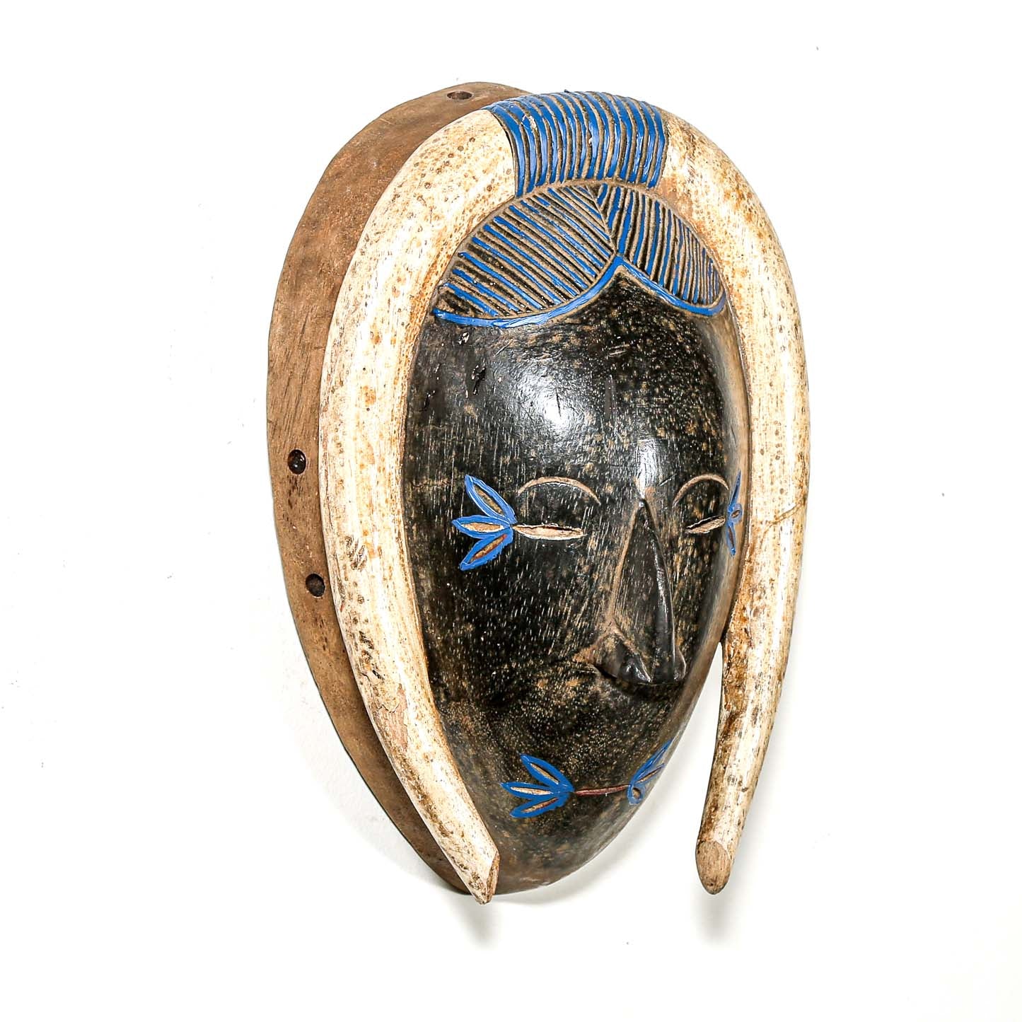 black and white African make with blue details