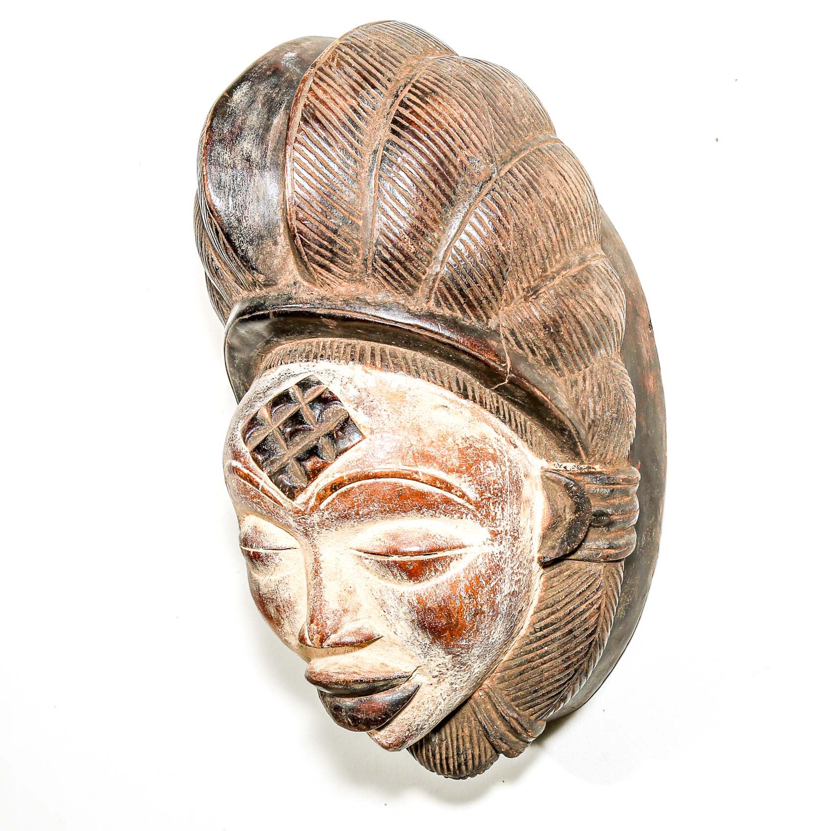 traditional tribal mask as African art to hang on the wall for Modern art decor 