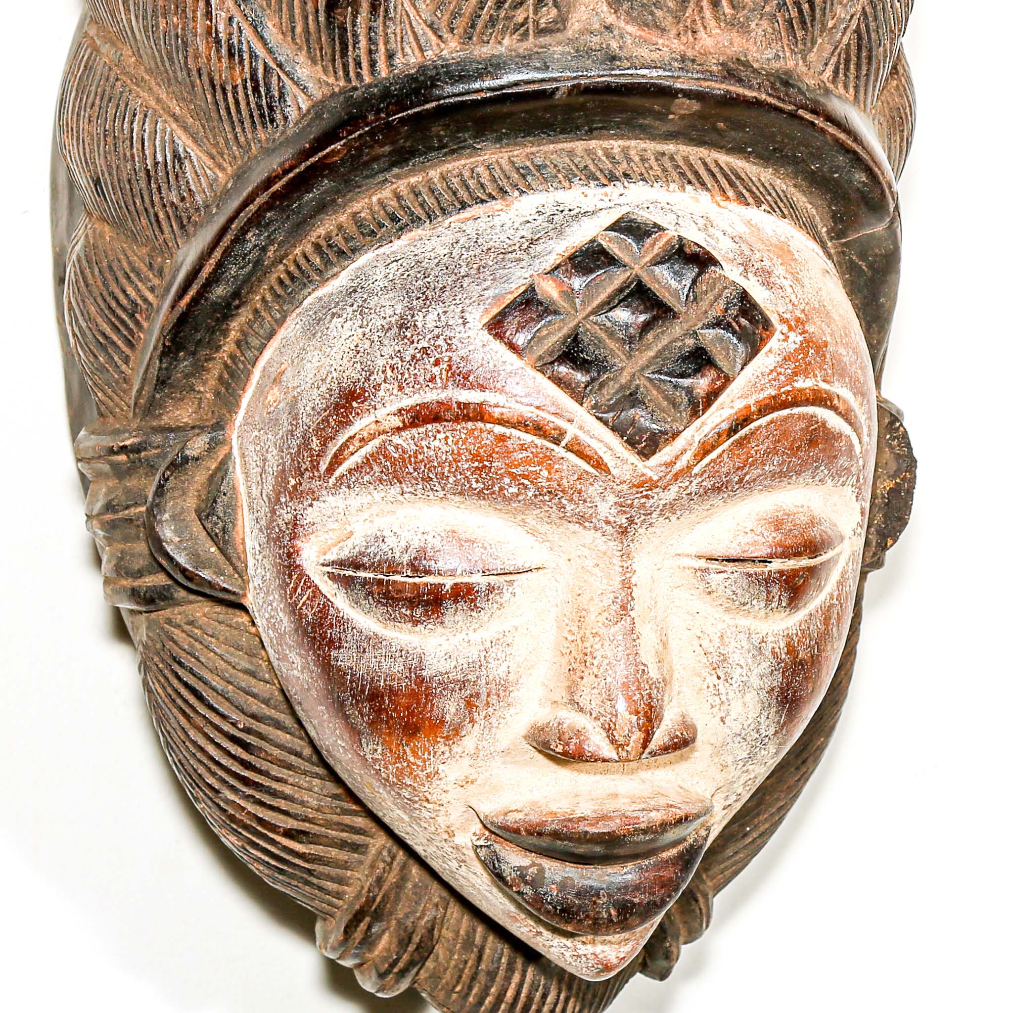 traditional tribal mask as African art to hang on the wall for Modern art decor 