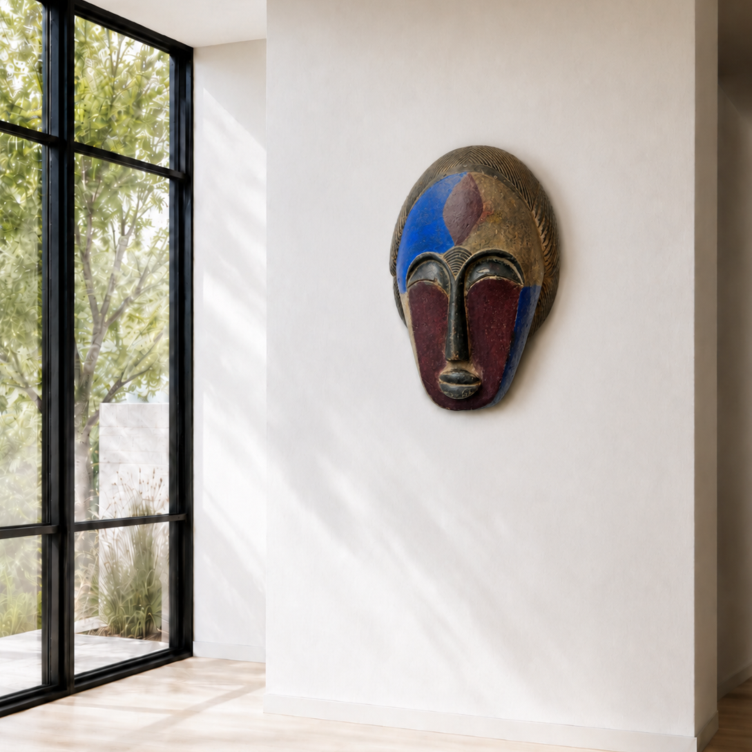Extra large huge Wooden African mask for the wall with blue and purple colors on a white background