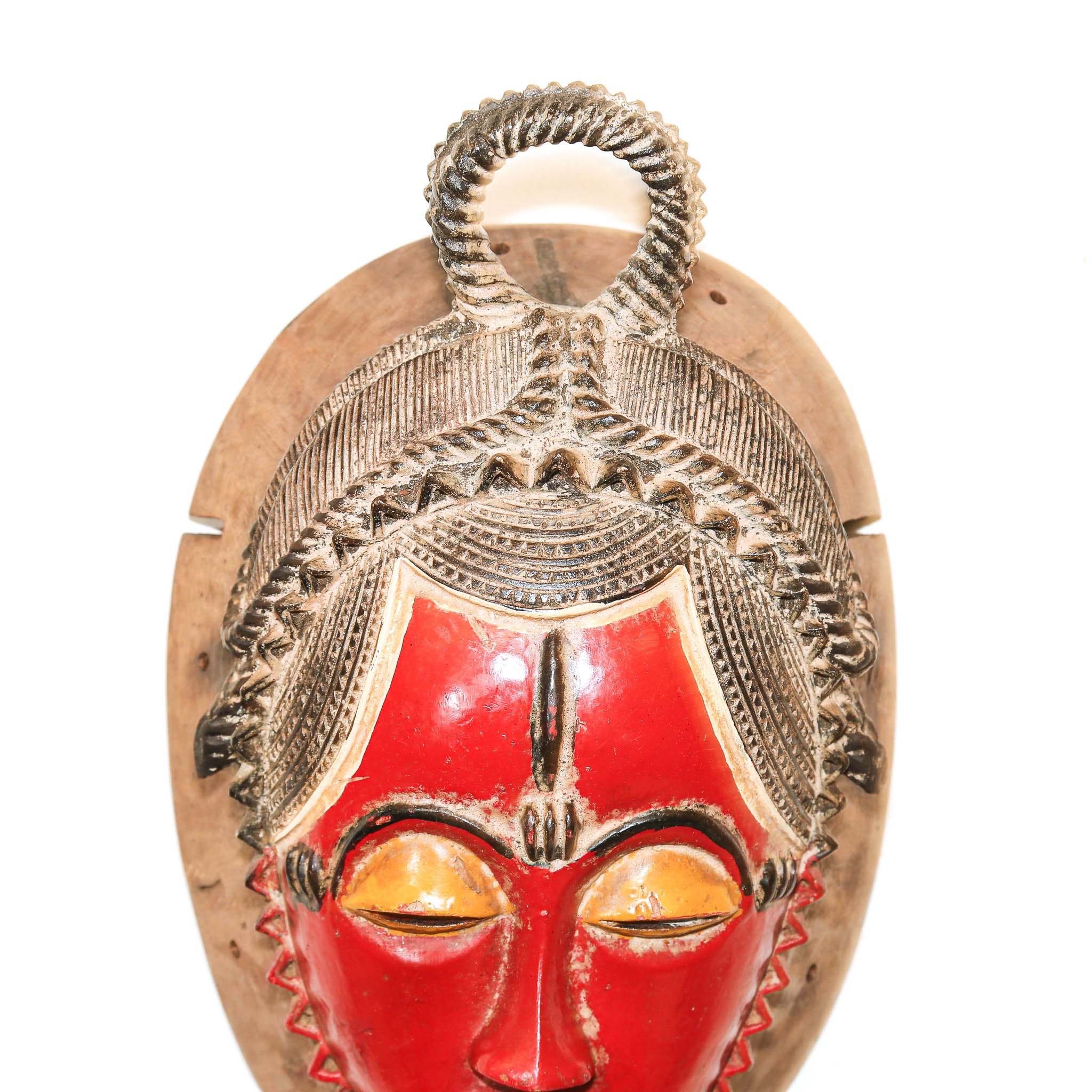 Small circular African wood mask by the Baule people