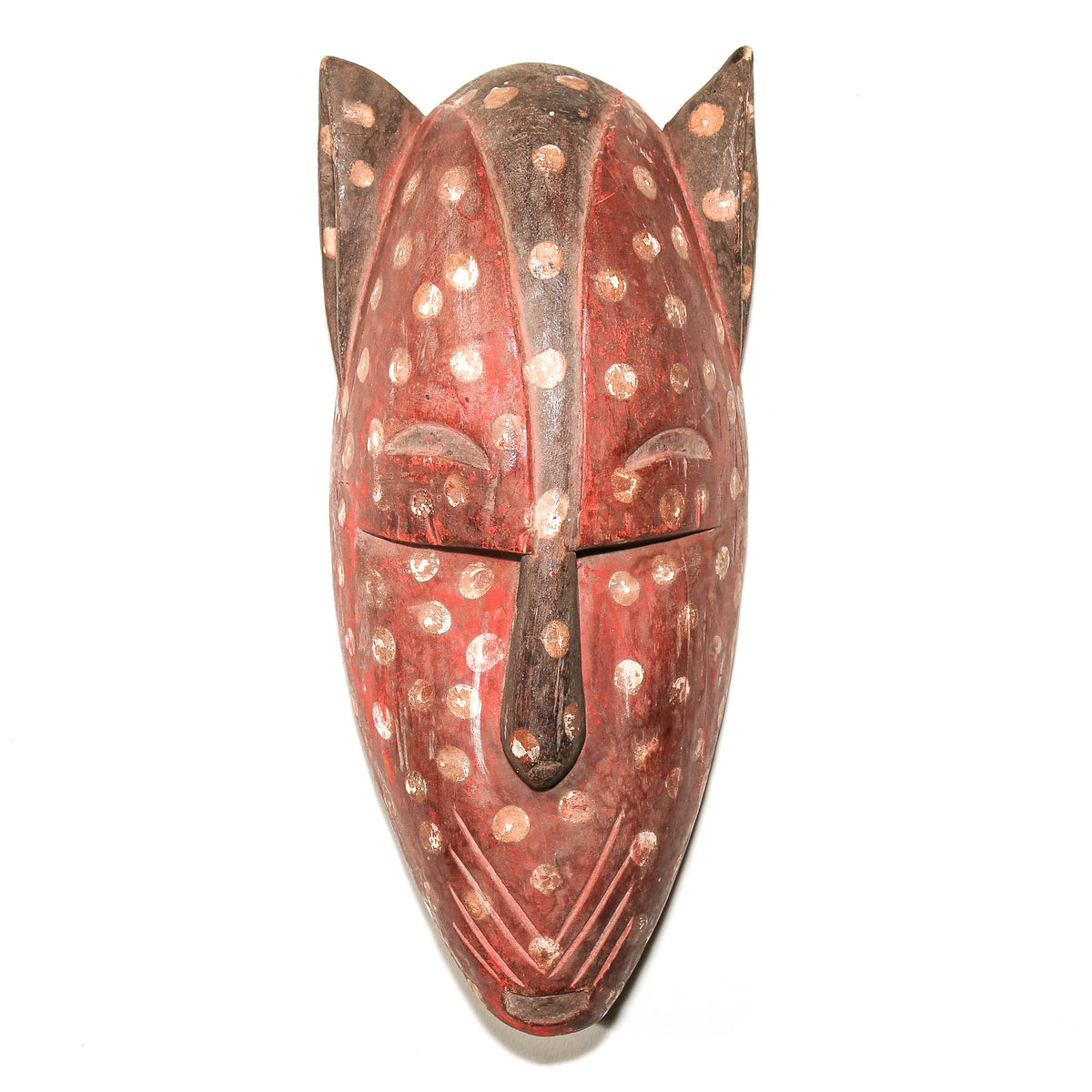 Carved Bamana feline mask from Mali featuring an expressive cat face and distinctive traditional African art form