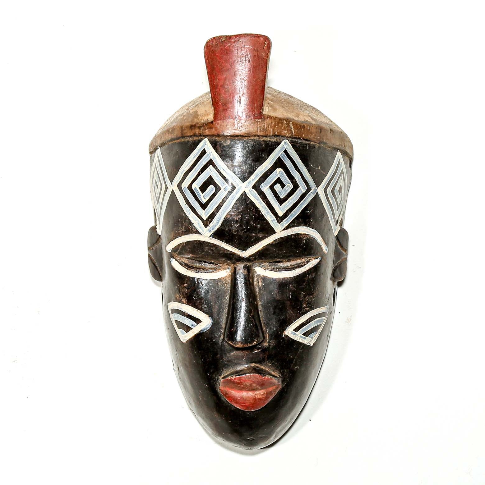 African-style wooden mask with black, white, and red colors on a white background for sale