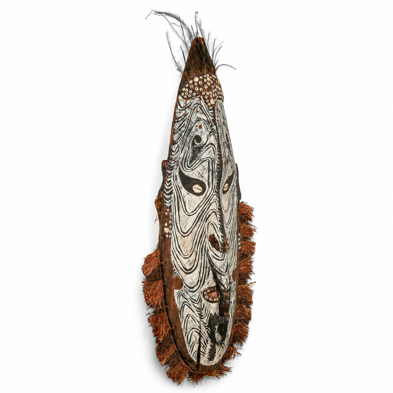 Decorative mask with intricate patterns and feathers on a white background