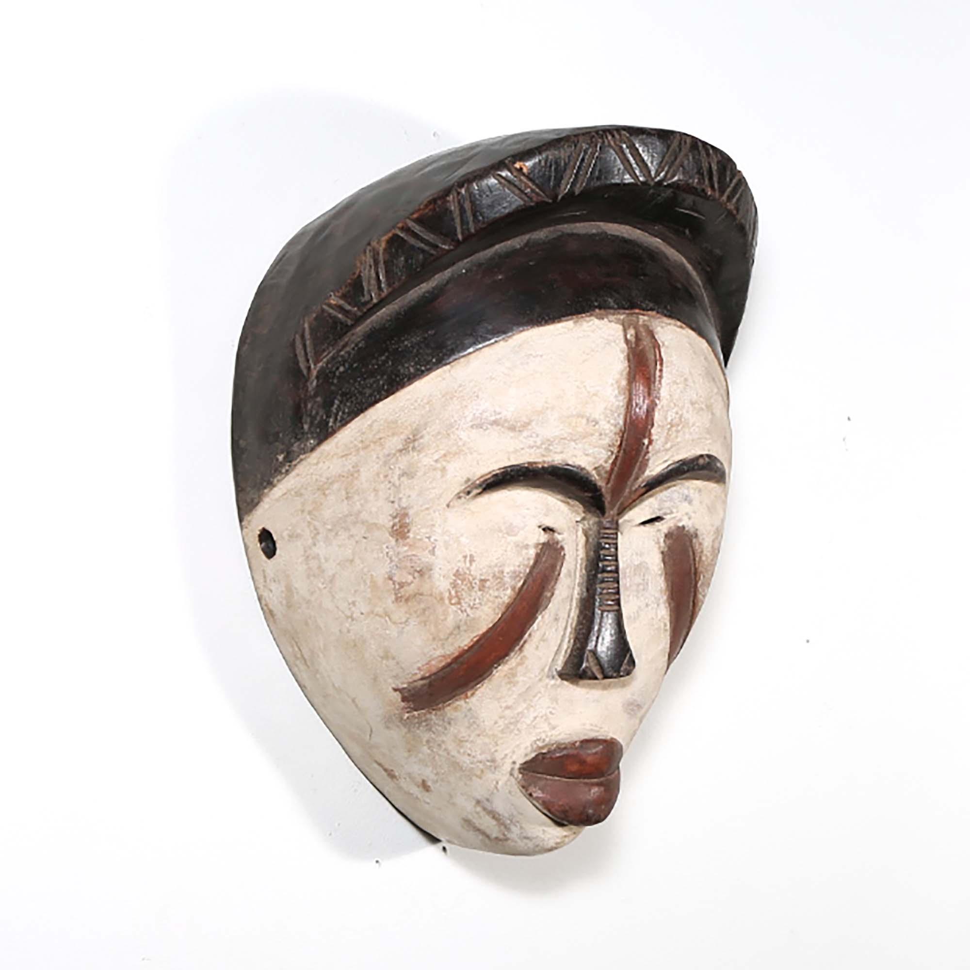 Punu Style Mask from Gabon as a wall decor ideas right side