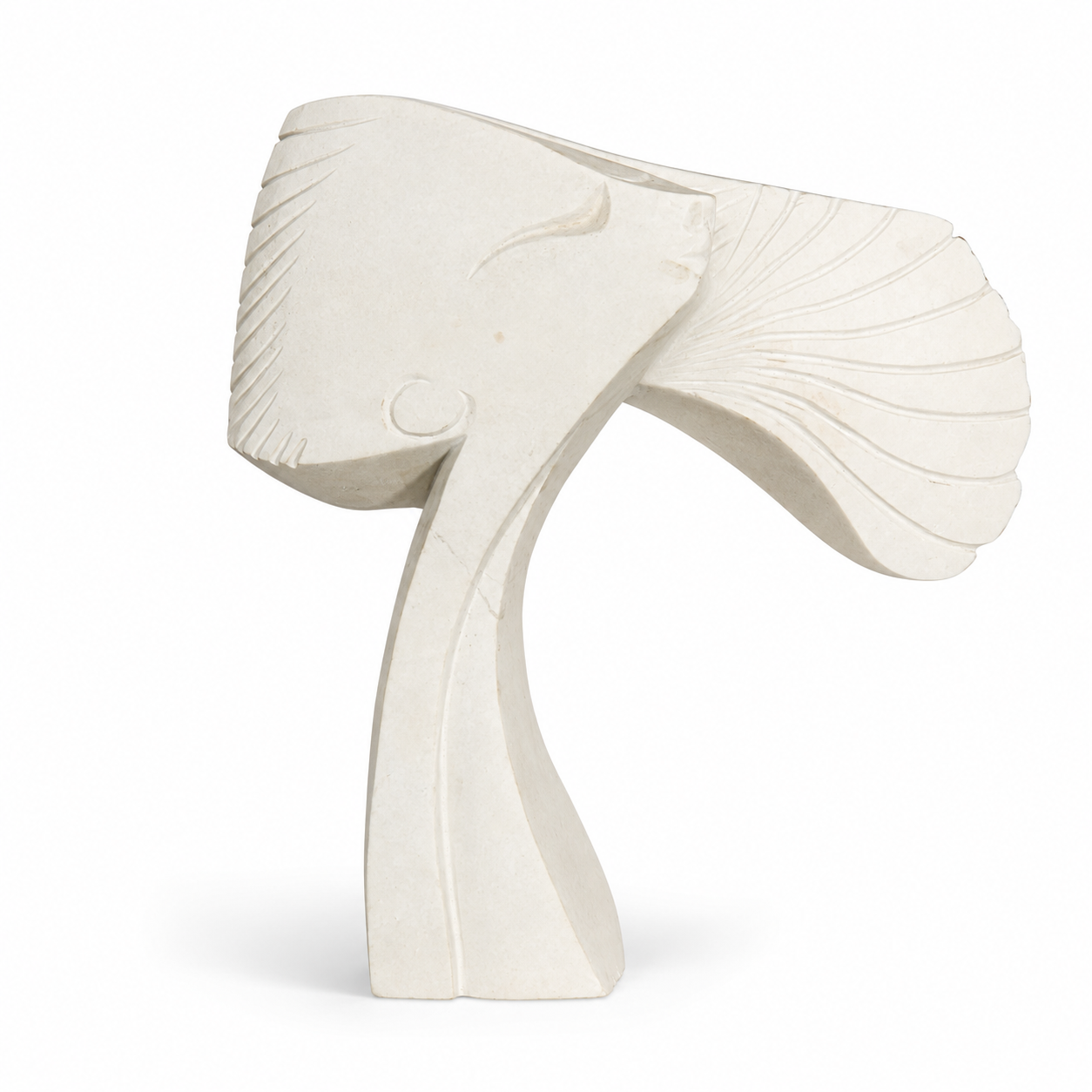 White stone abstract sculpture of a woman's face with hair blowing in the wind on a white background