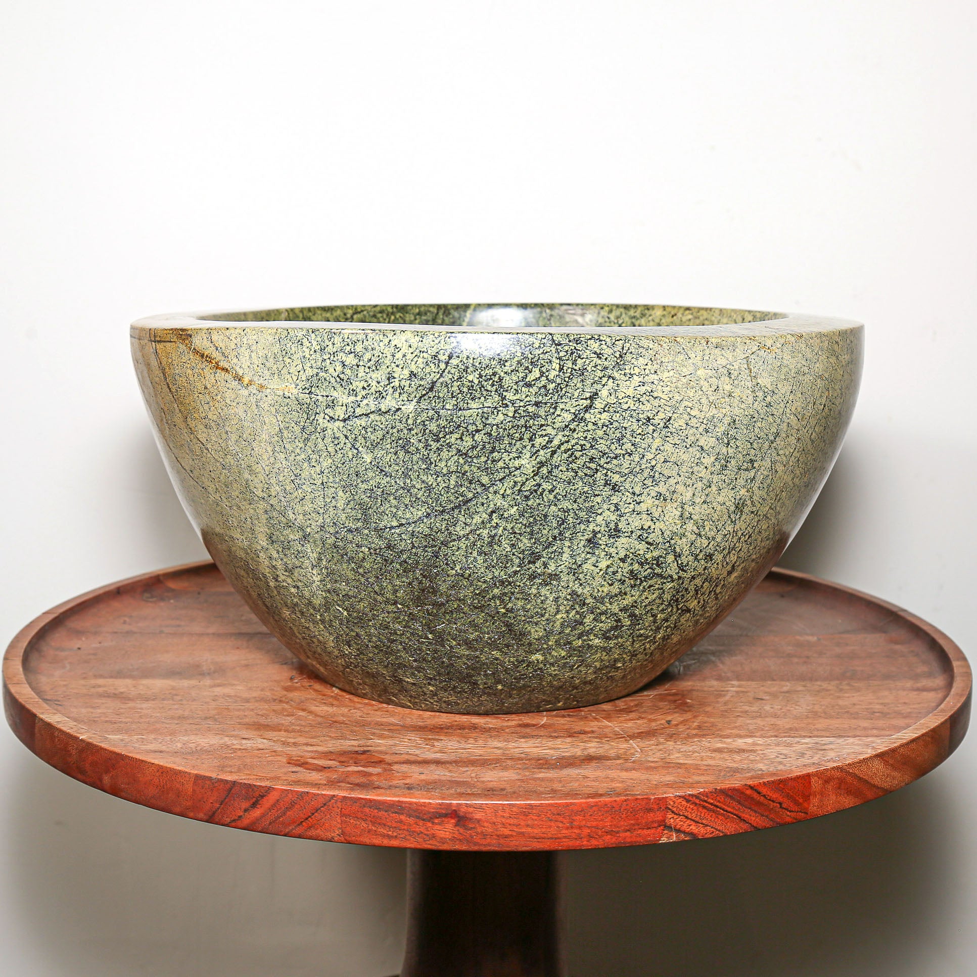 Green bowl carved in stone