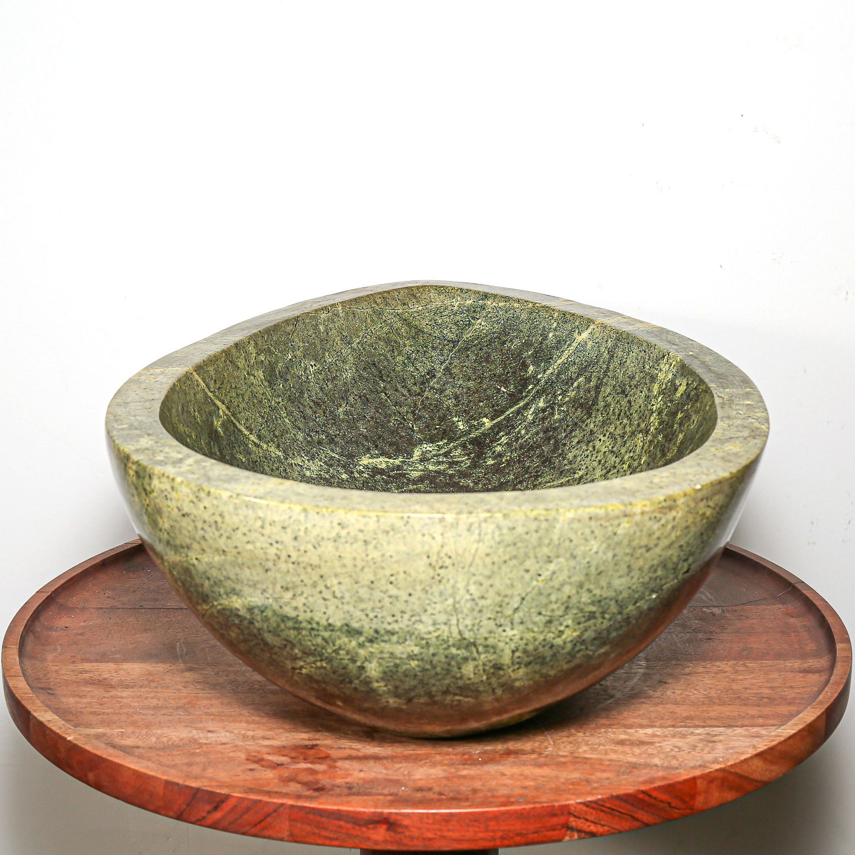 stone bowl in the shape of a tear-drop