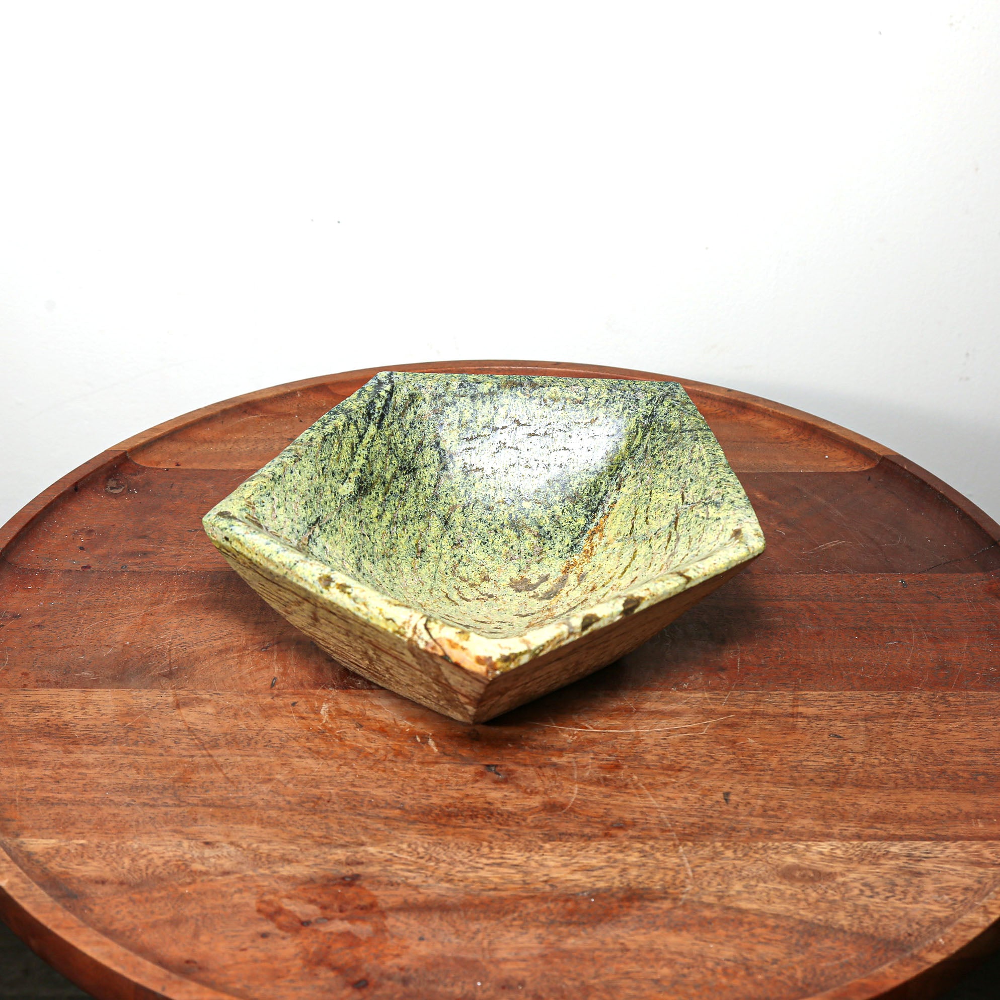 Small Green stone bowl in the shape of a pentagon