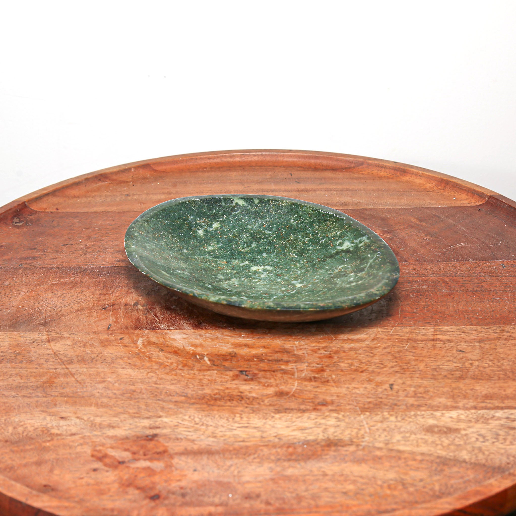 small round green hand carved stone dish for modern home decor