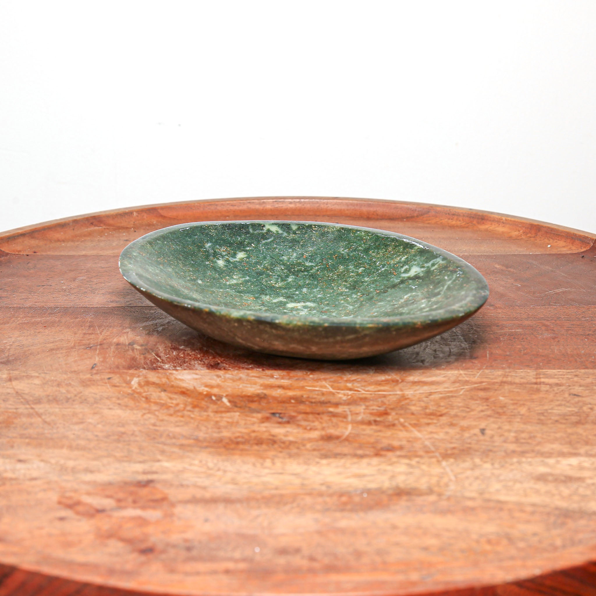 small round green hand carved stone dish for modern home decor