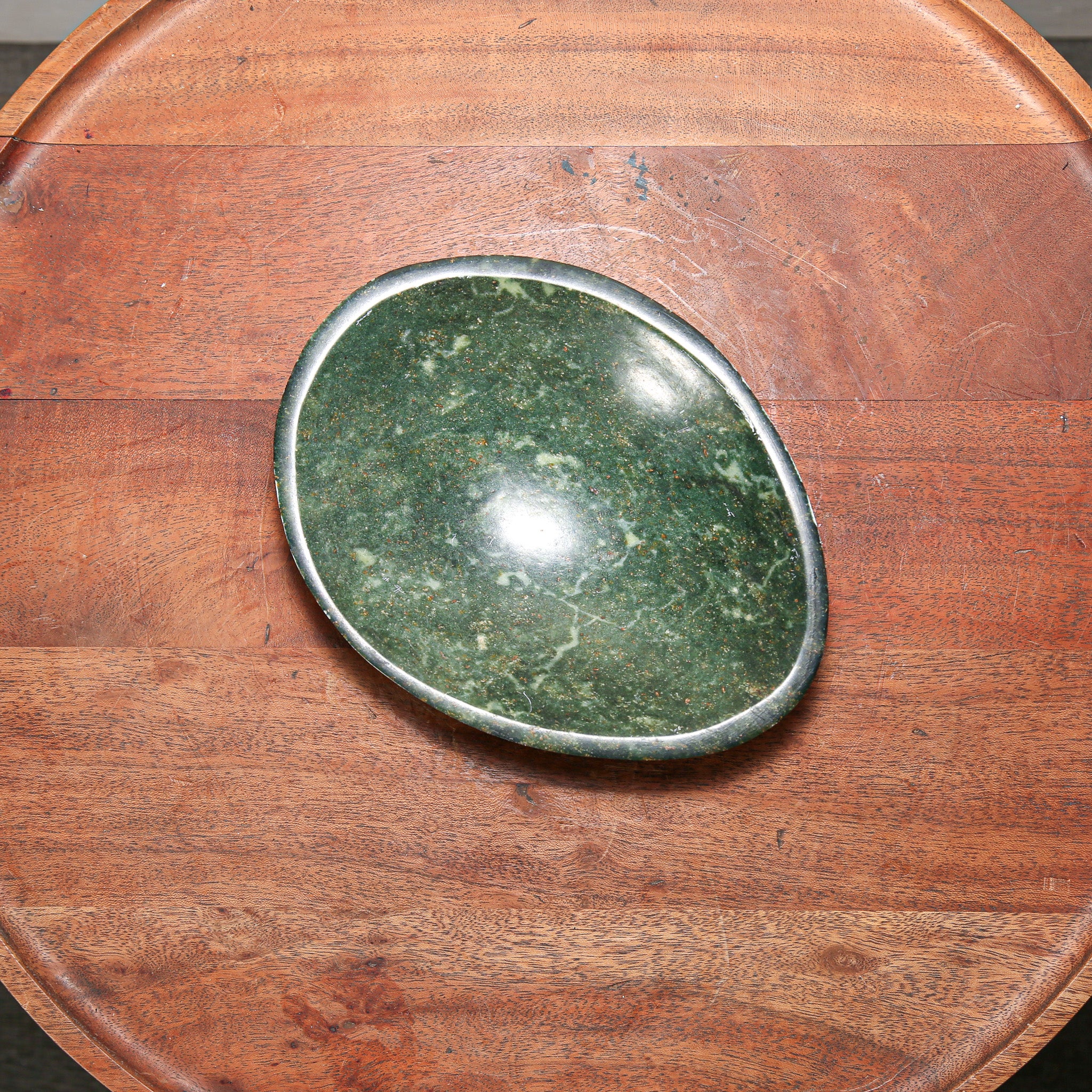 small round green hand carved stone dish for modern home decor