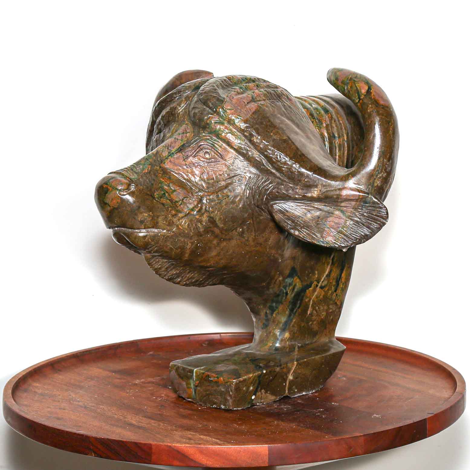 Sculpture of a buffalo. In hand carved and handmade stone