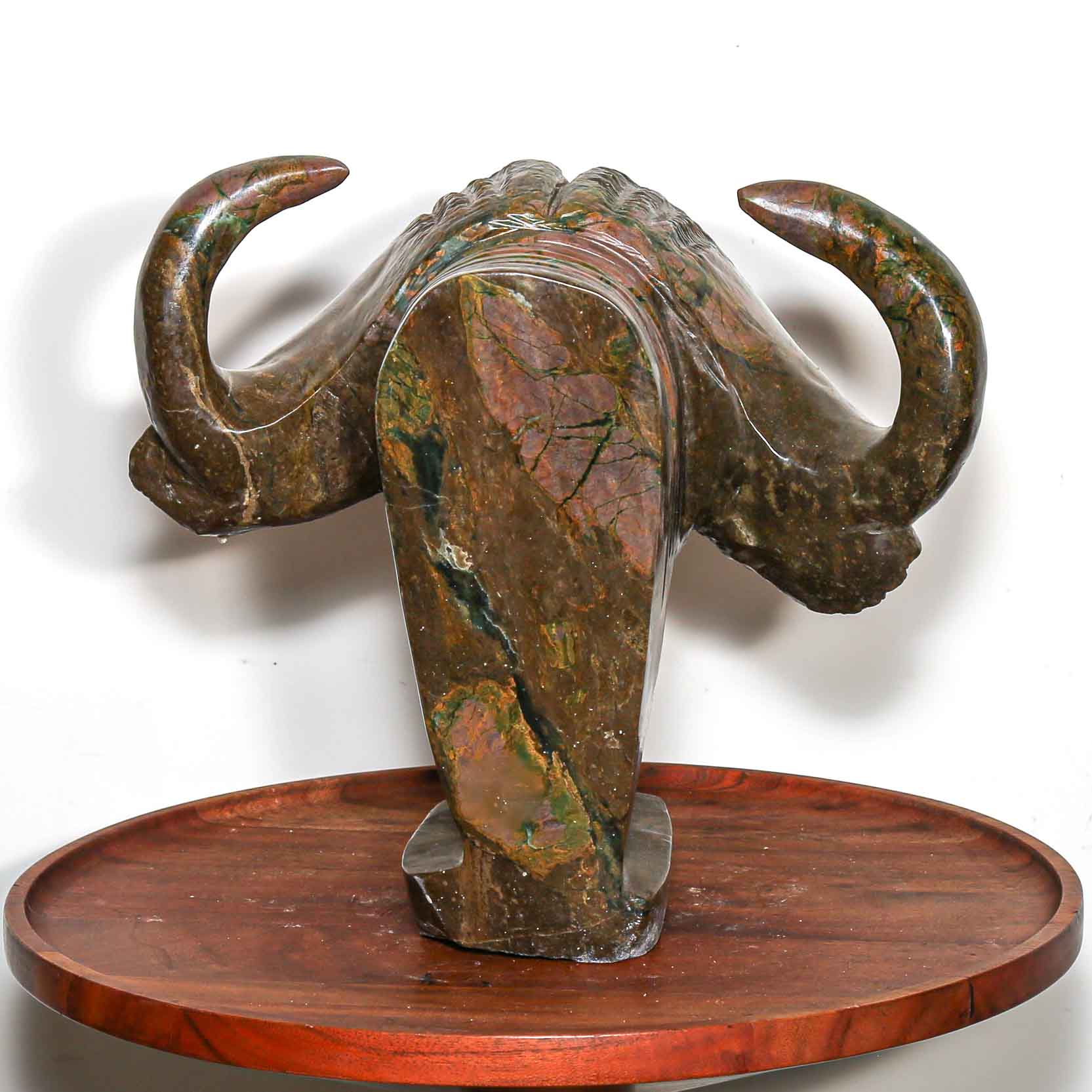 Sculpture of a buffalo. In hand carved and handmade stone